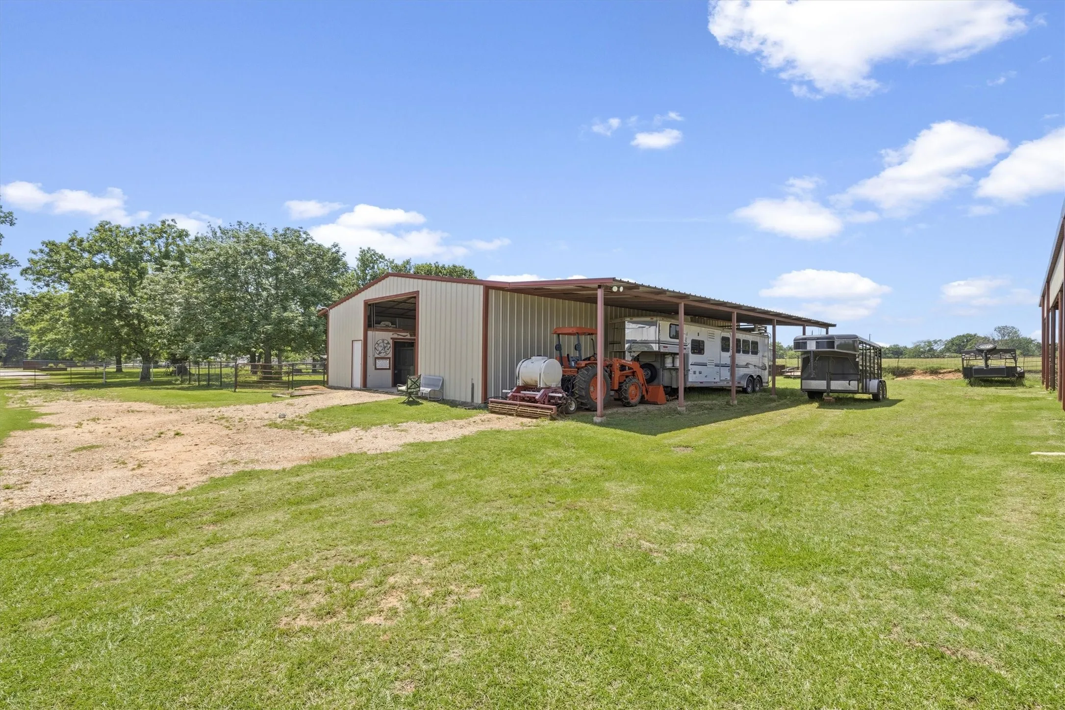 Barn with lean to for equipment