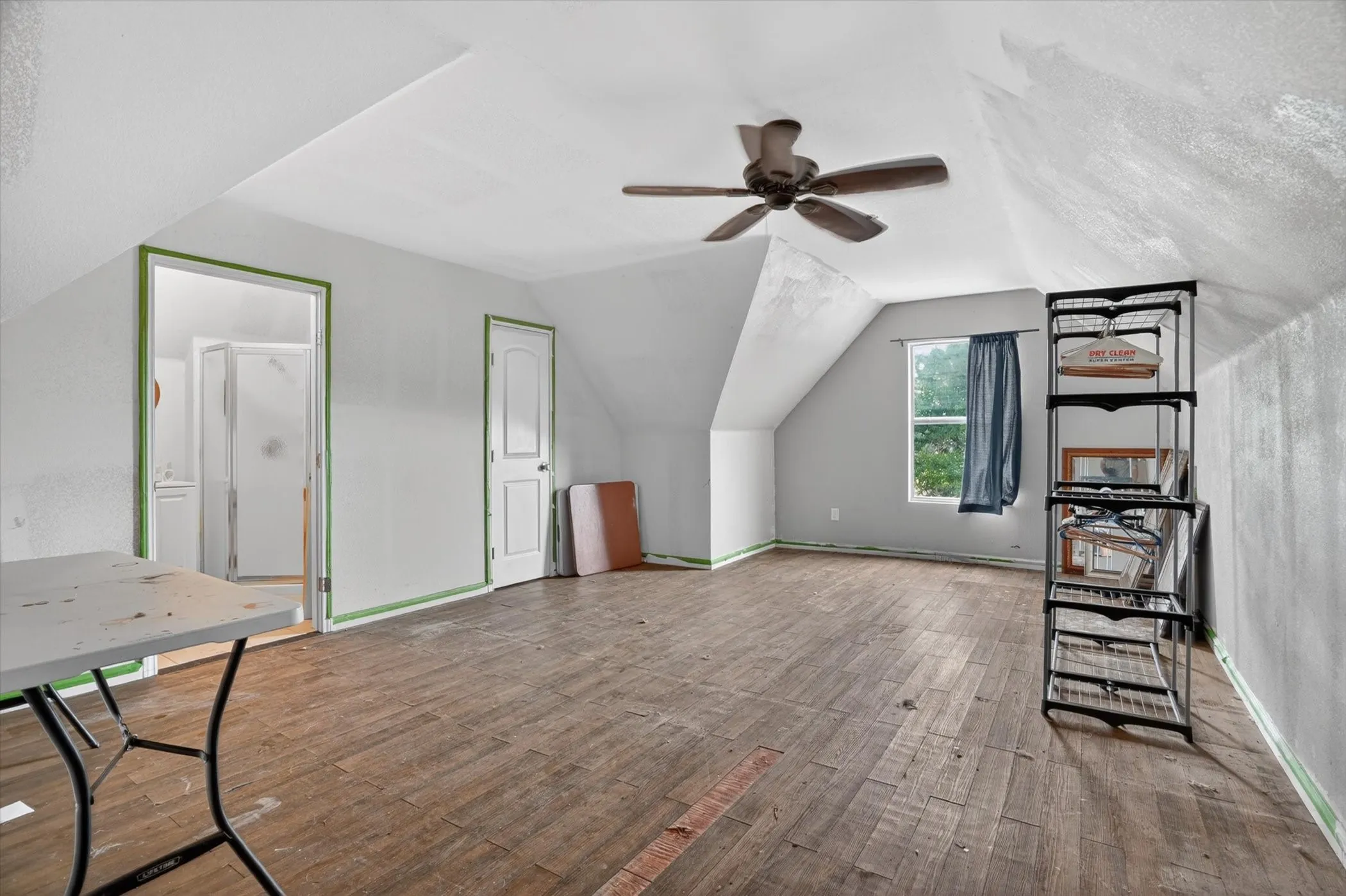 Unfinished bonus room with full bath.  Needs some work, however basics are there