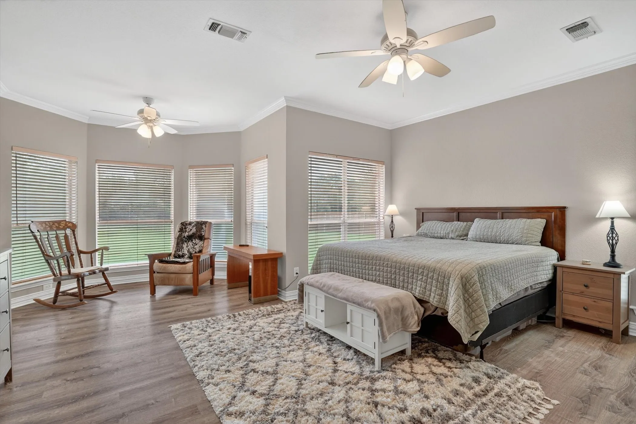 Oversized bedroom with sunroom area.