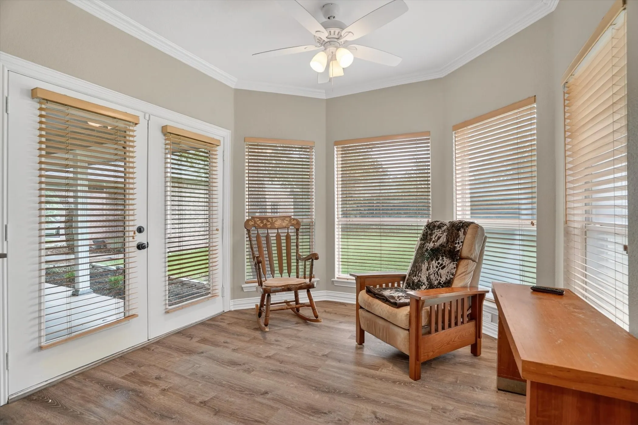 Sitting area in the primary bedroom, overlooking the backyard.