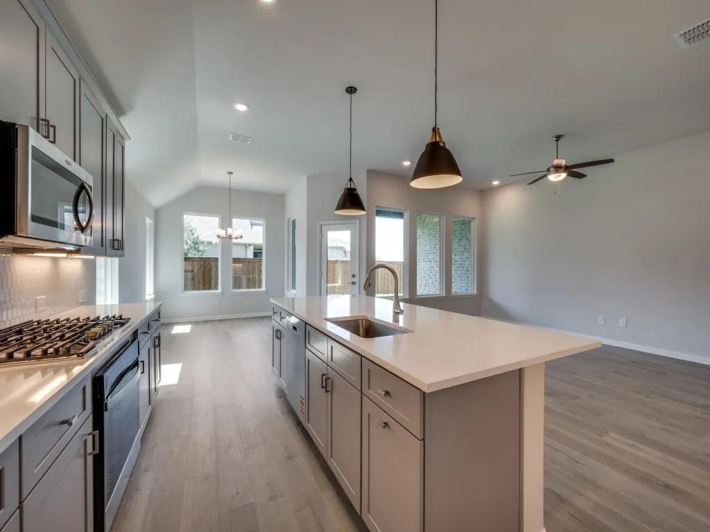 The chef will never be left out of the party in this wonderful open concept design.