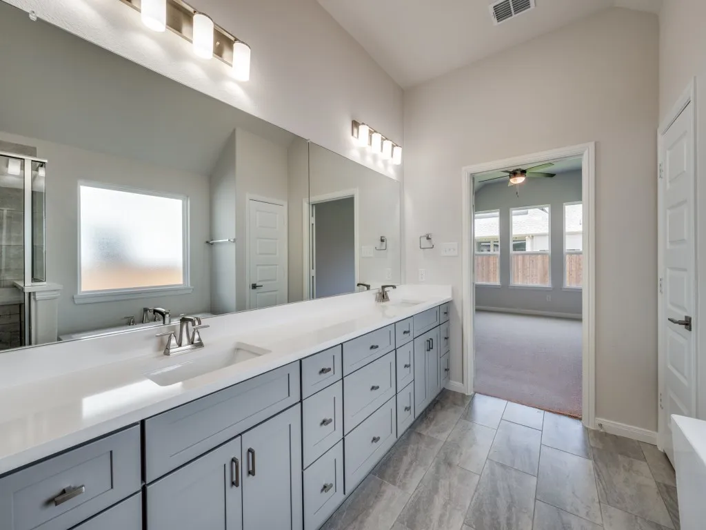 No shortage of space or style in this gorgeous owner's bath!