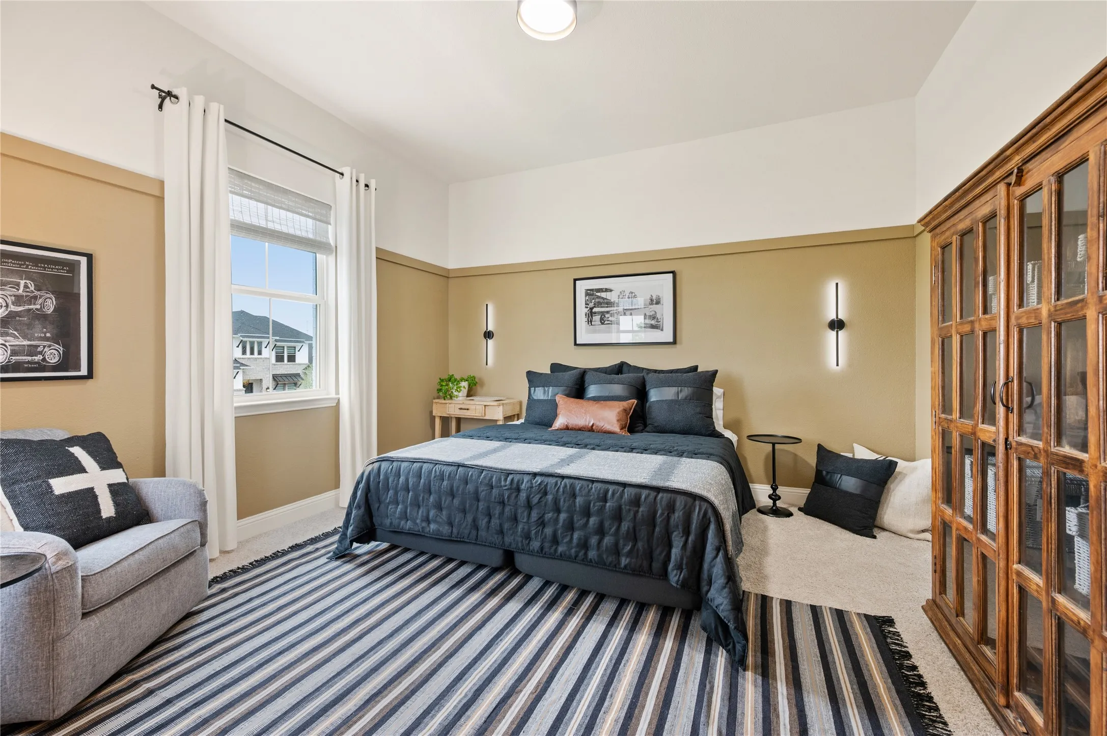 Bedroom on second level with ensuite bath and custom paint, lighting and more