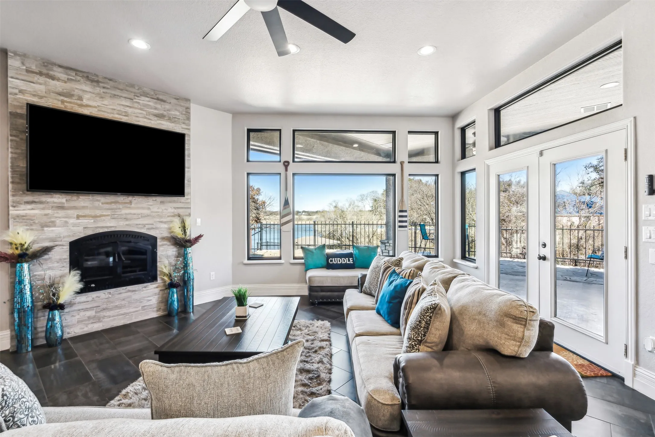 Wood burning fireplace living room with a lake view!