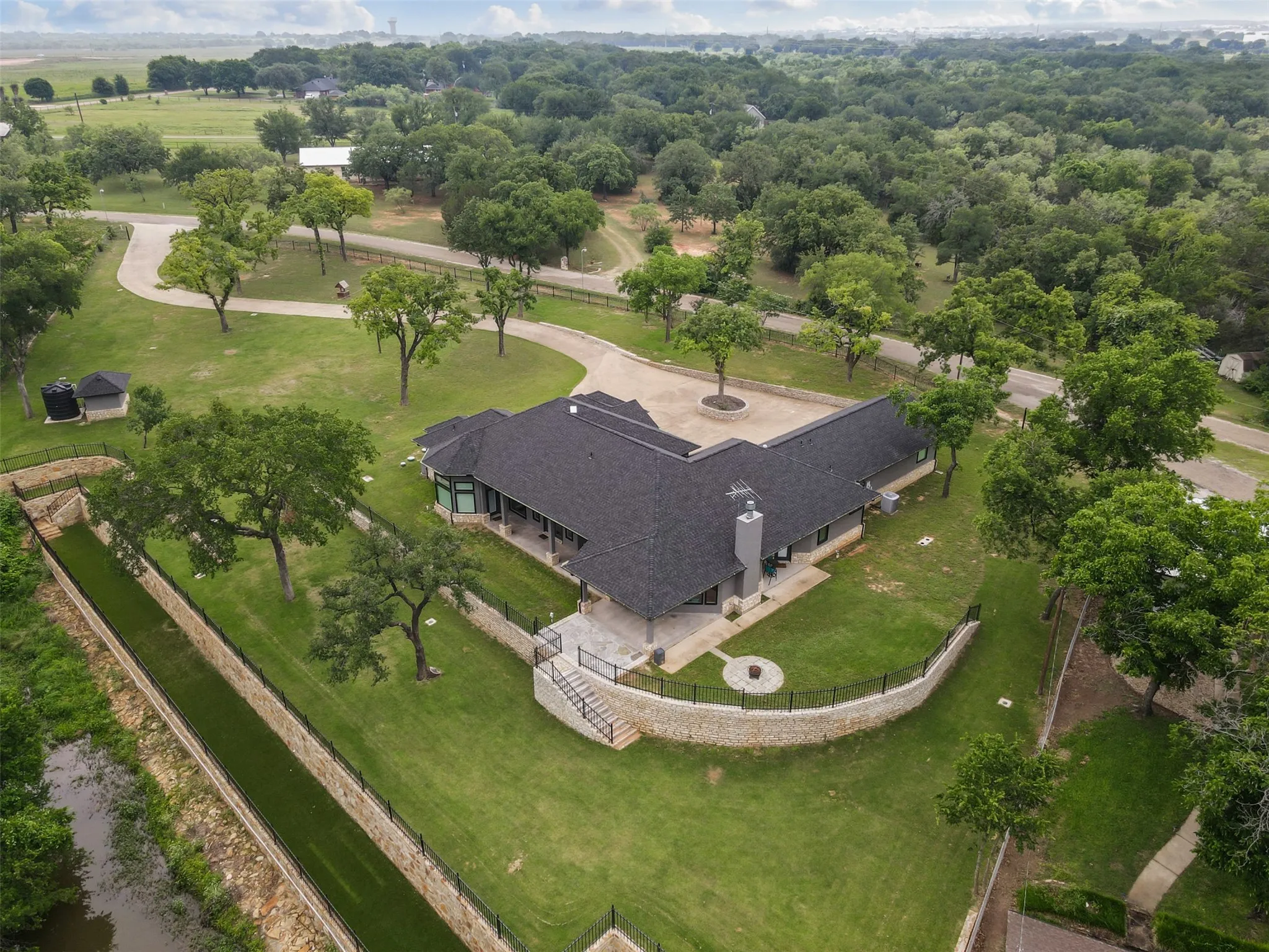 200' of WATERFRONT access plus turfed for sun-tanning chairs and putt-putt!