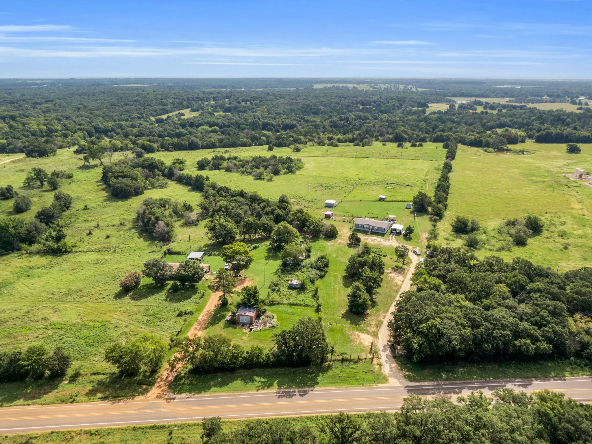 Beautiful Aeral view of property with acreage