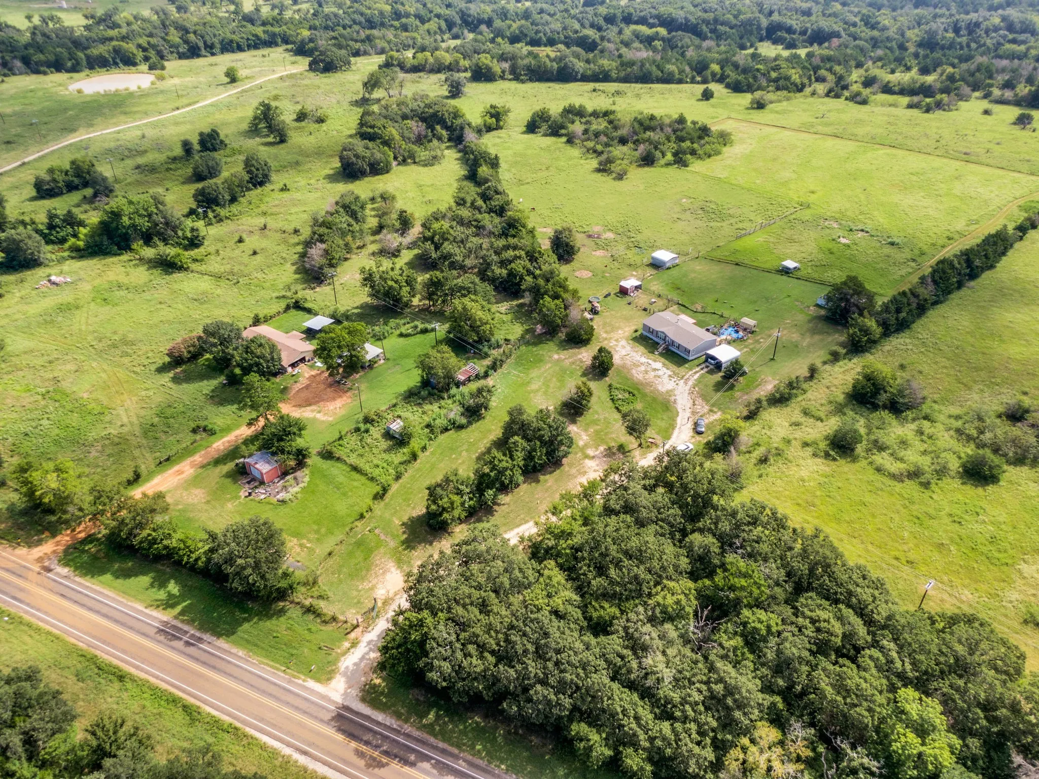 Beautiful Aeral view of property with acreage
