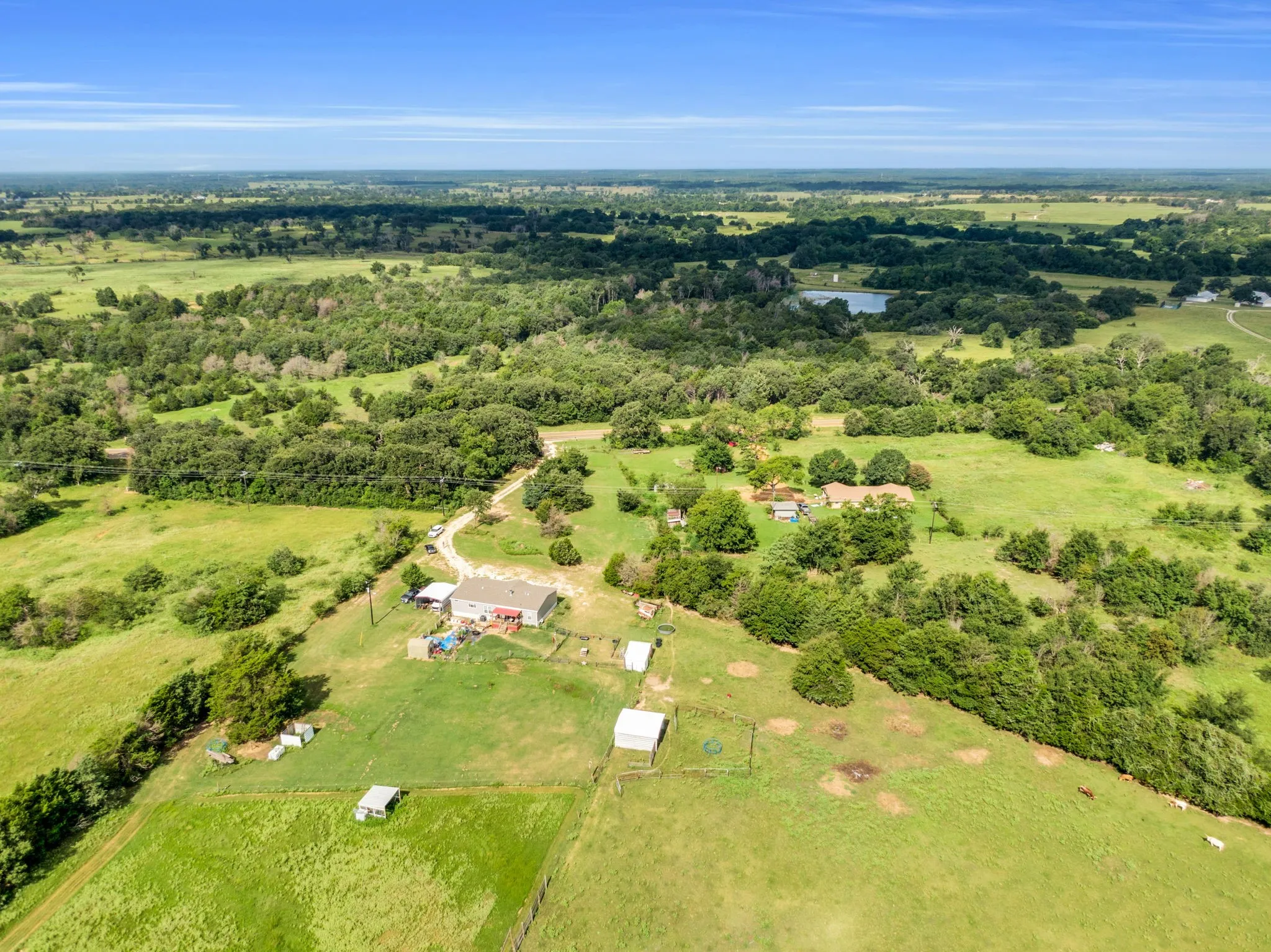 Beautiful Aeral view of property with acreage