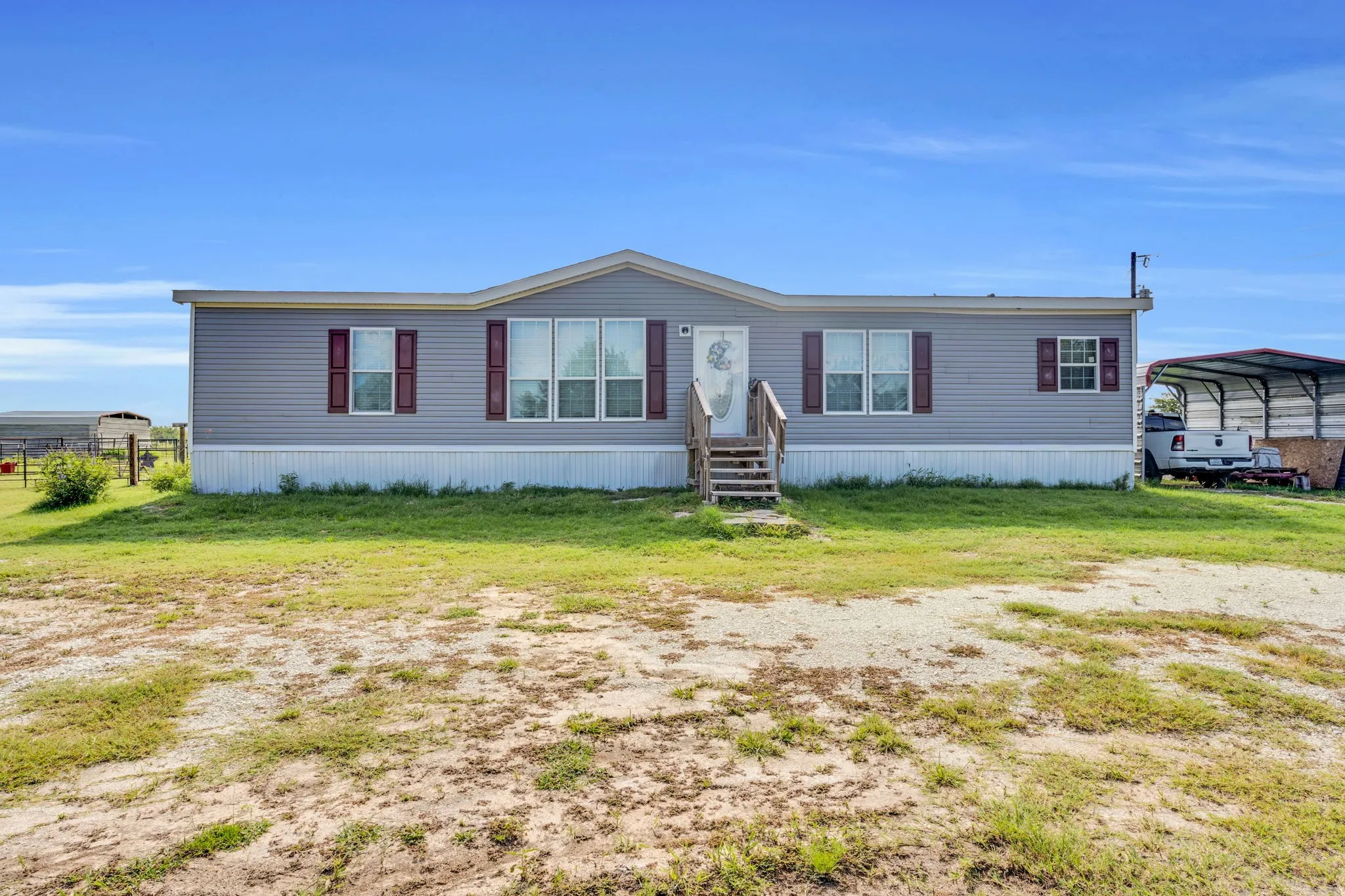 Front of home sitting on 4 acres of land