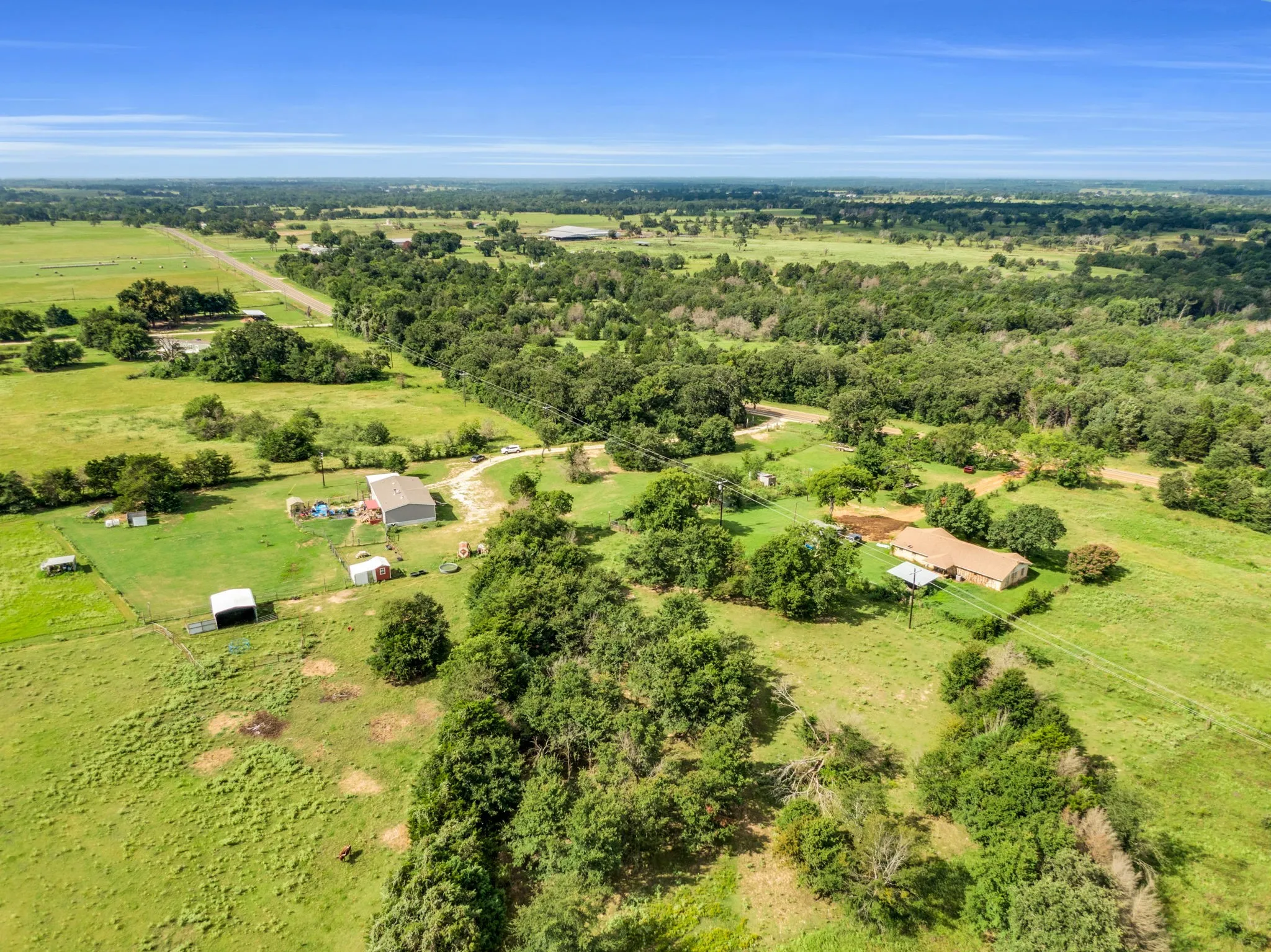 Beautiful Aeral view of property with acreage