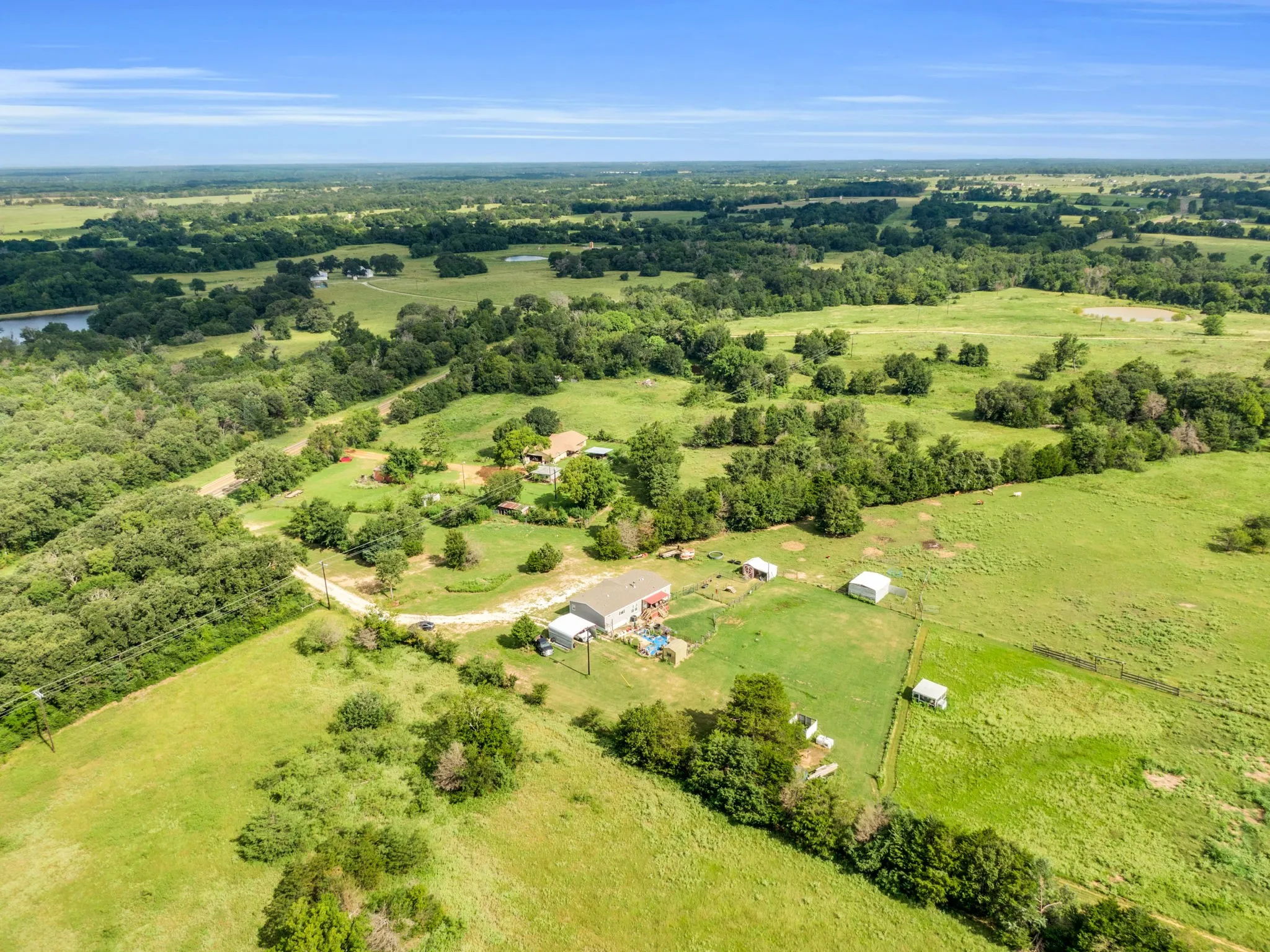 Beautiful Aeral view of property with acreage