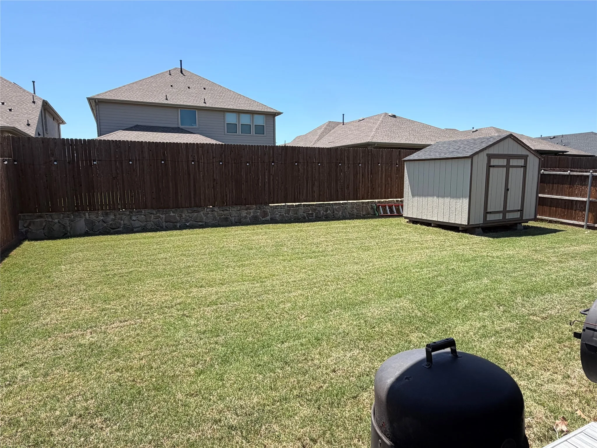Large Yard with Storage Building