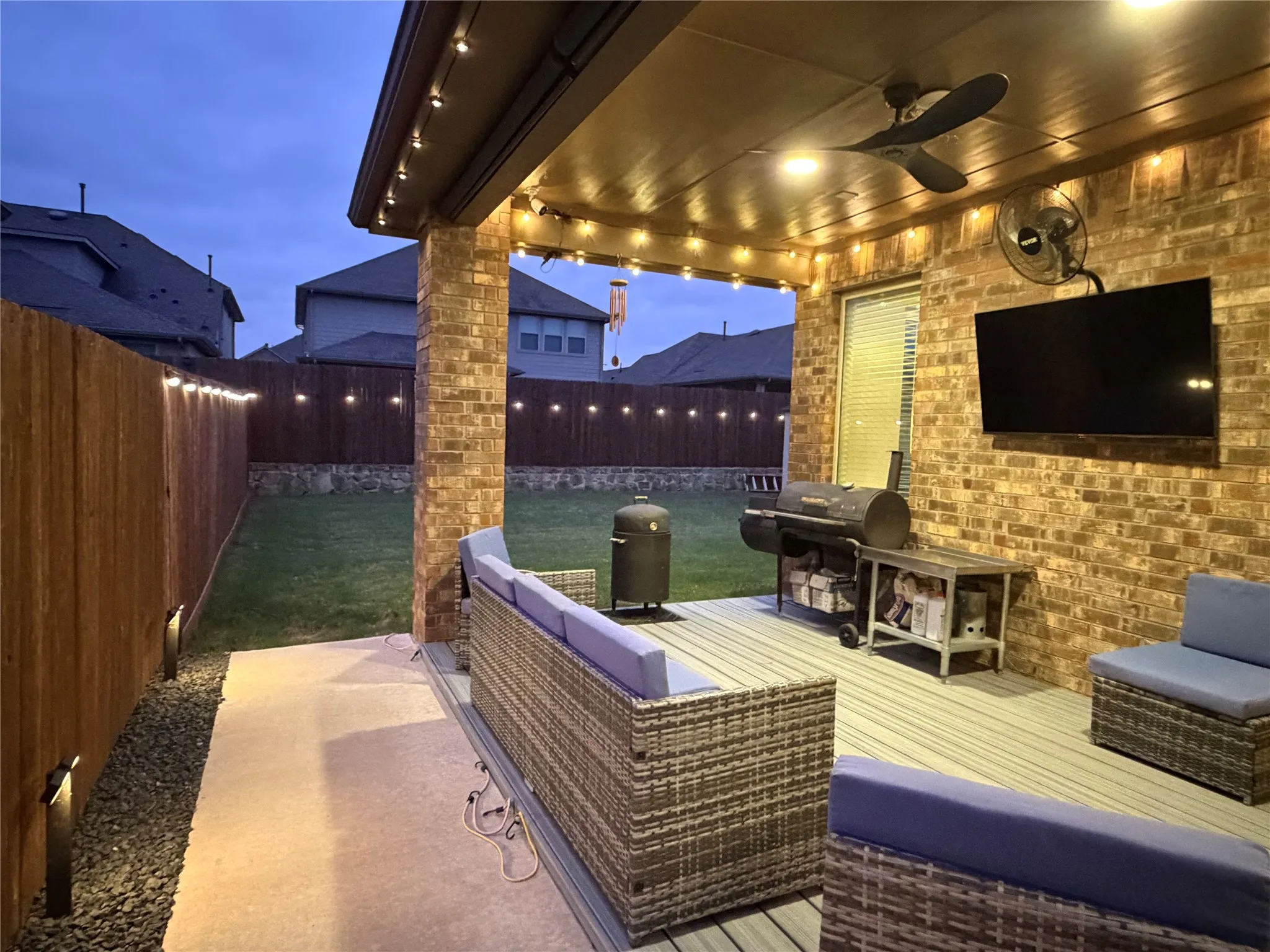 Comprehensive Lighting System that Illuminates the Covered Patio, Extended Deck, Fence and Entire Home Exterior Allowing Exciting Outdoor Entertainment.