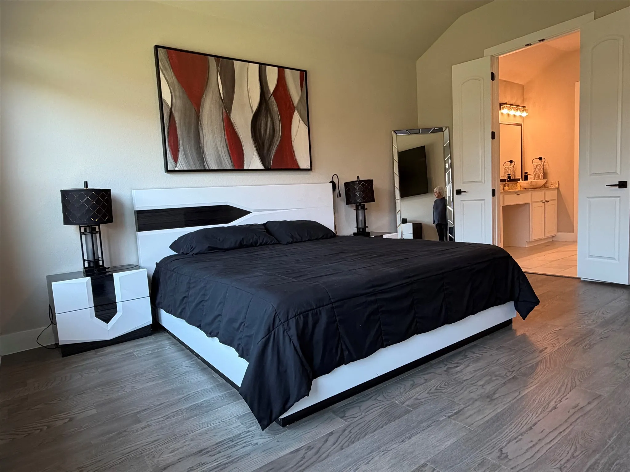 Featuring an En-Suite Bath with Twin Vanities and A Sit-Down Makeup Table.