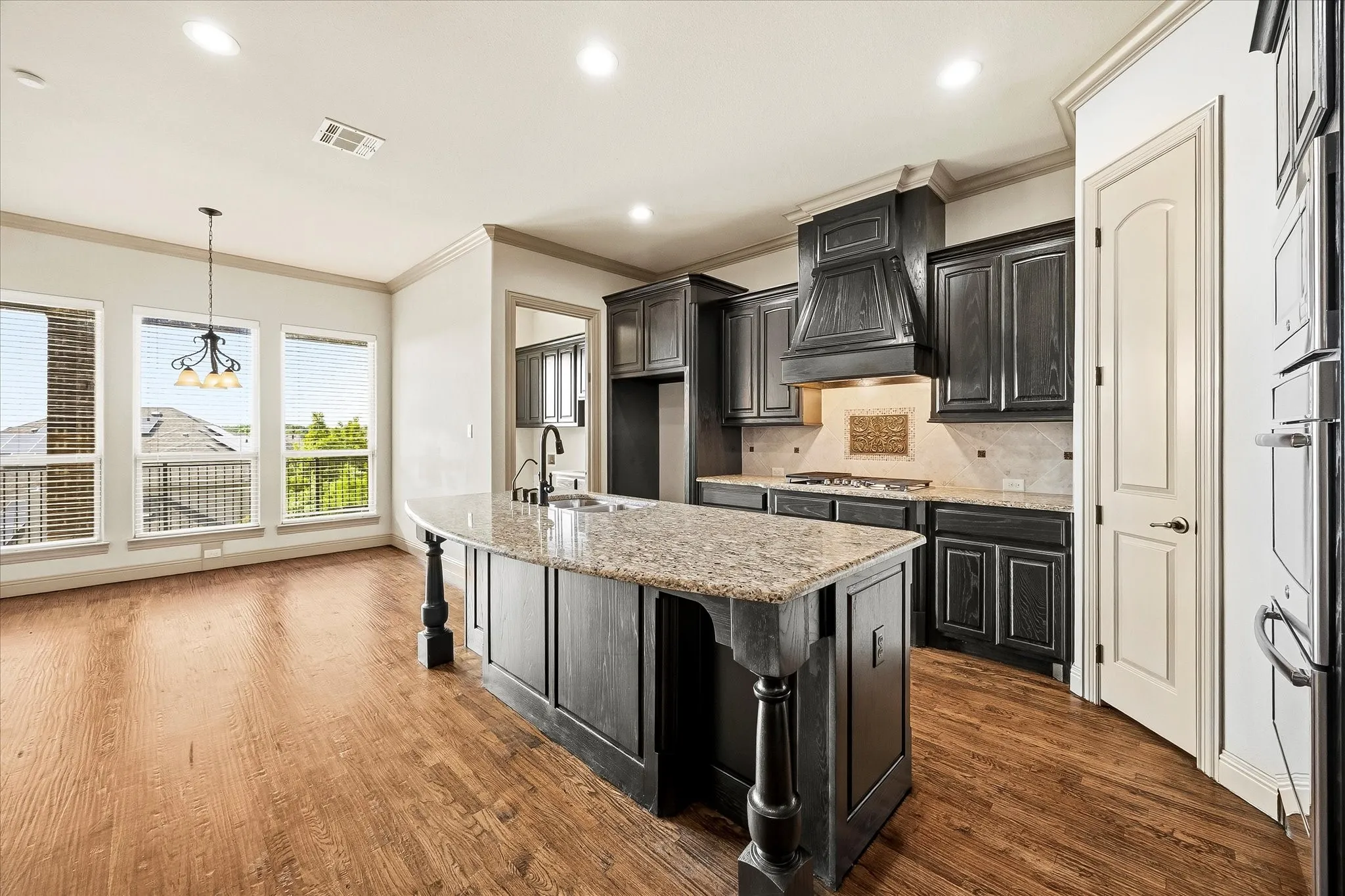 Center island-breakfast bar is one of this kitchen's many amenities!