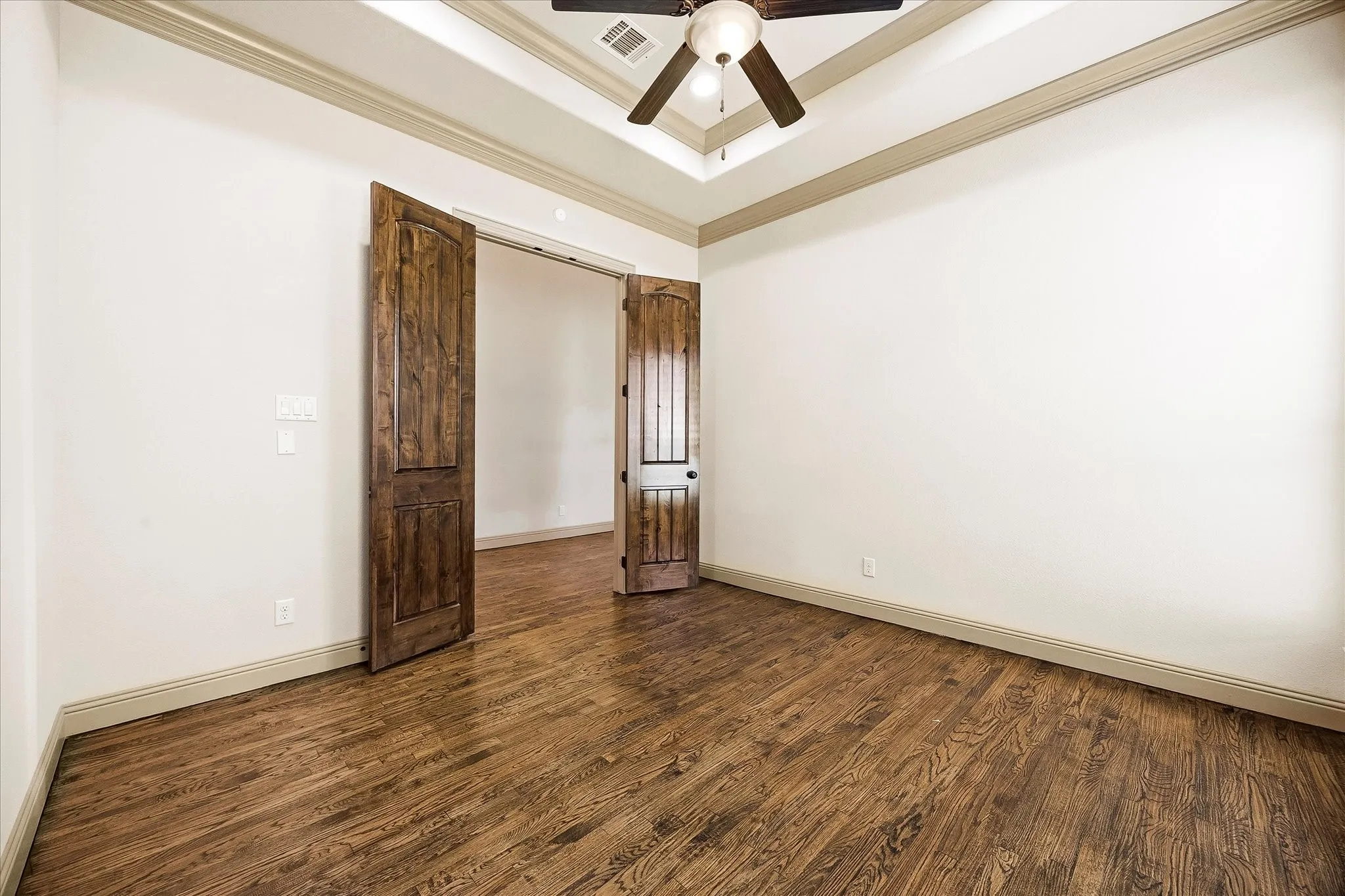 Home office includes solid wood doors to ensure privacy