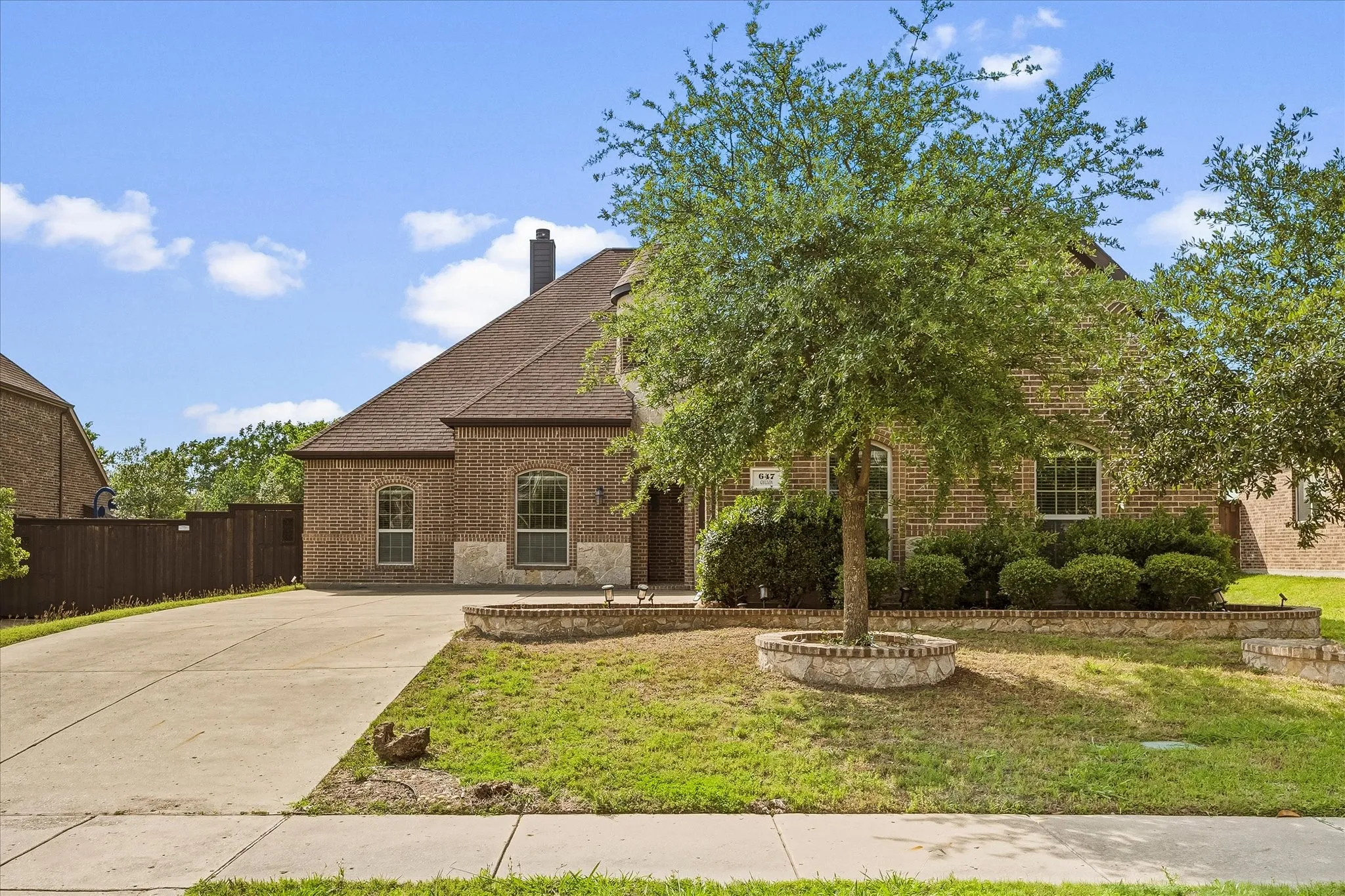 Extended drive provides ample parking spaces for your family and friends
