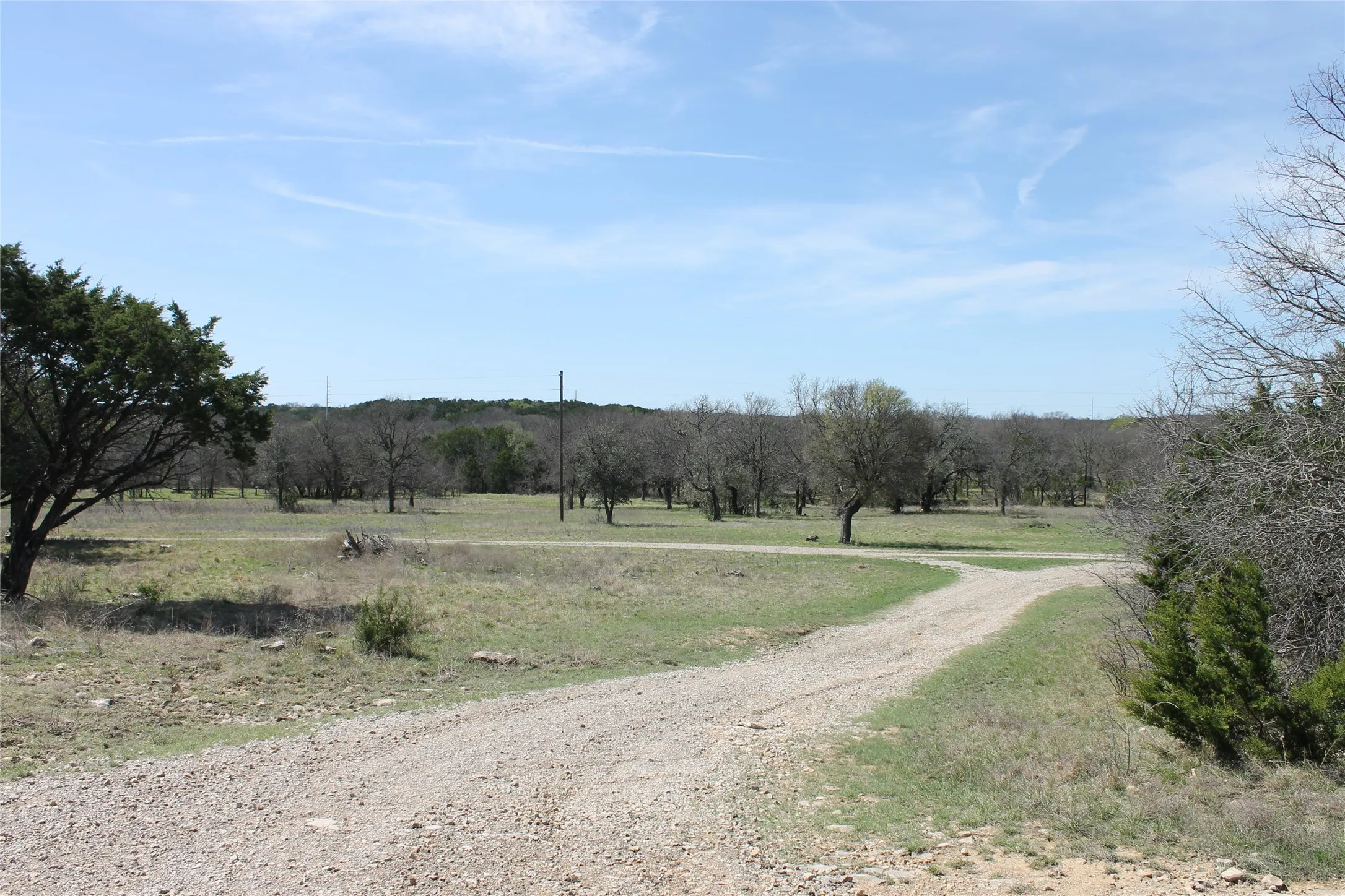 Gravel pathway winding throughout parts of the property