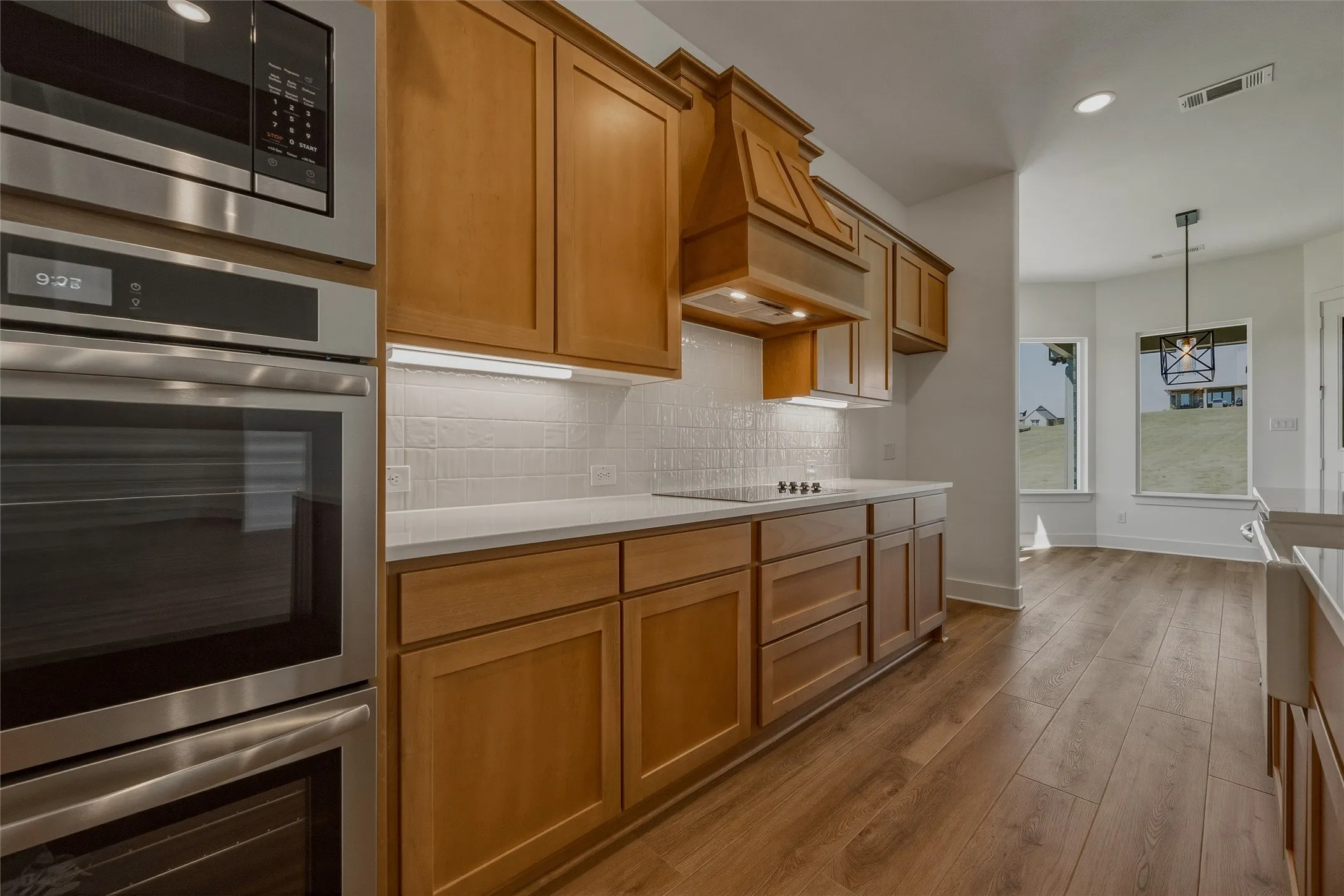 Stainless steel built-in oven and microwave