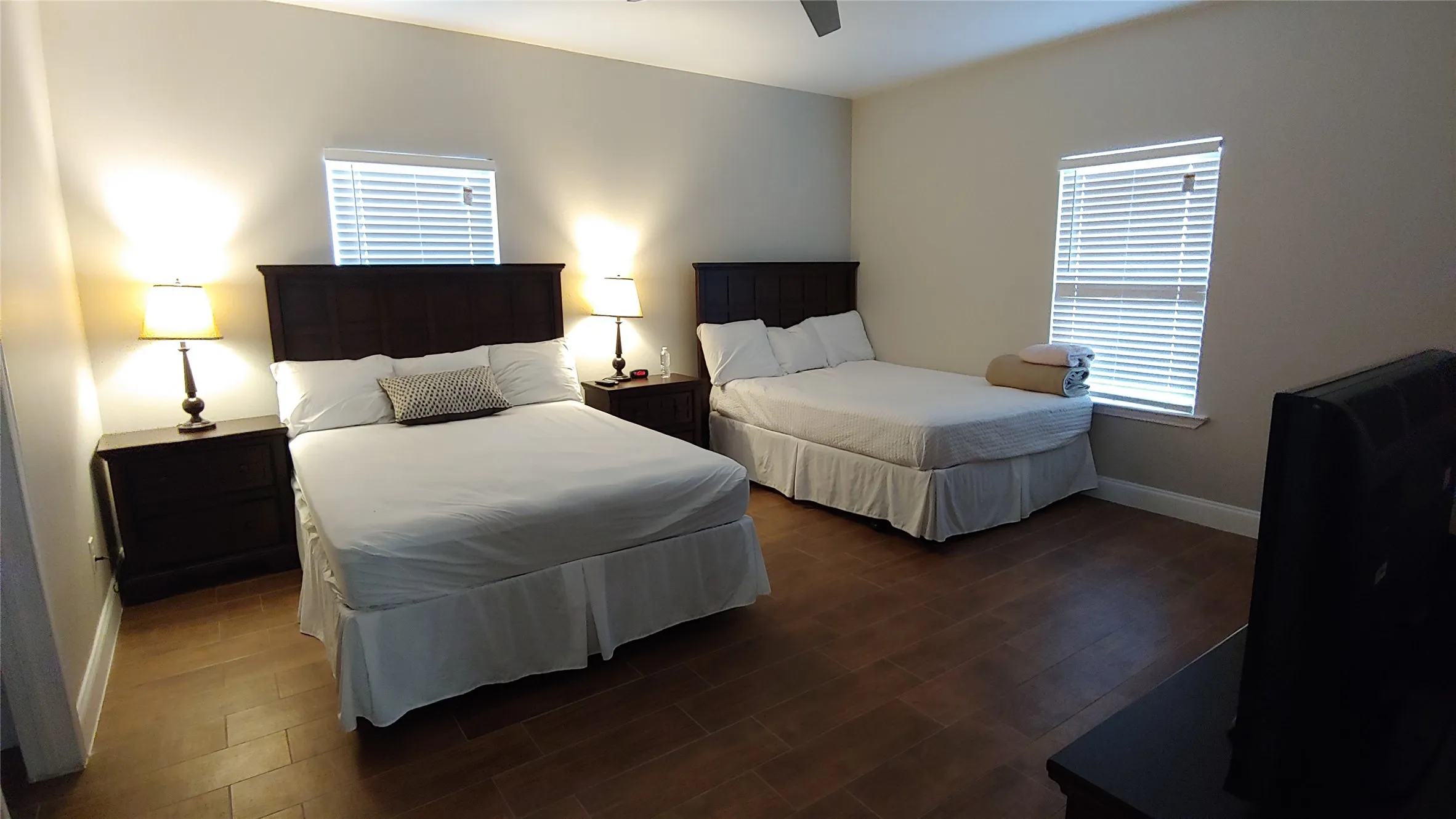 Here is a spacious bedroom with lots of room to relax.