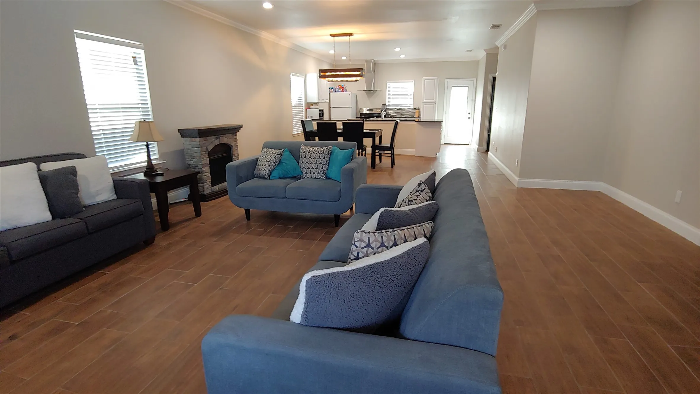 Living area peeking into kitchen.