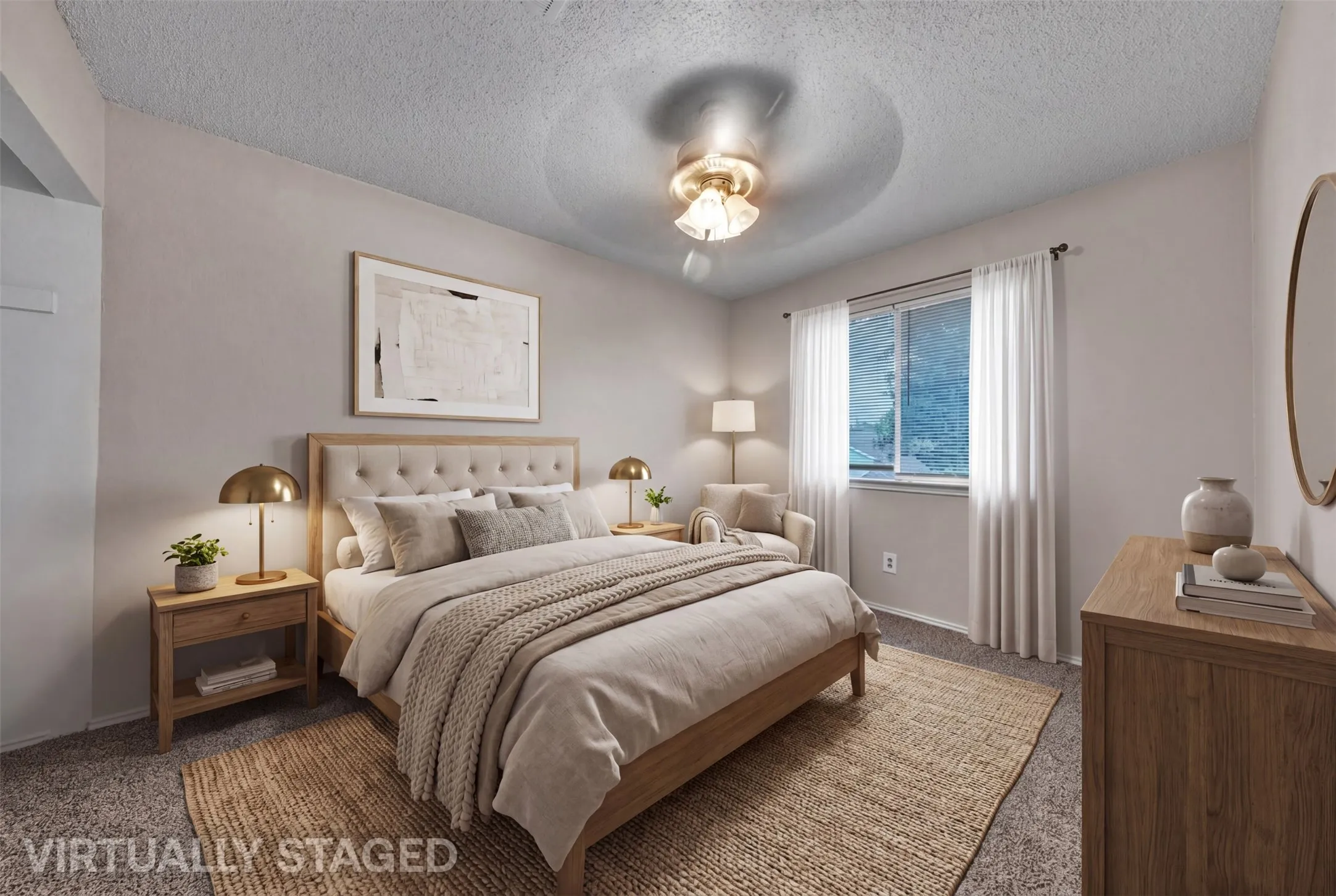Bedroom featuring carpet flooring, a window with white drapes, and a ceiling fan