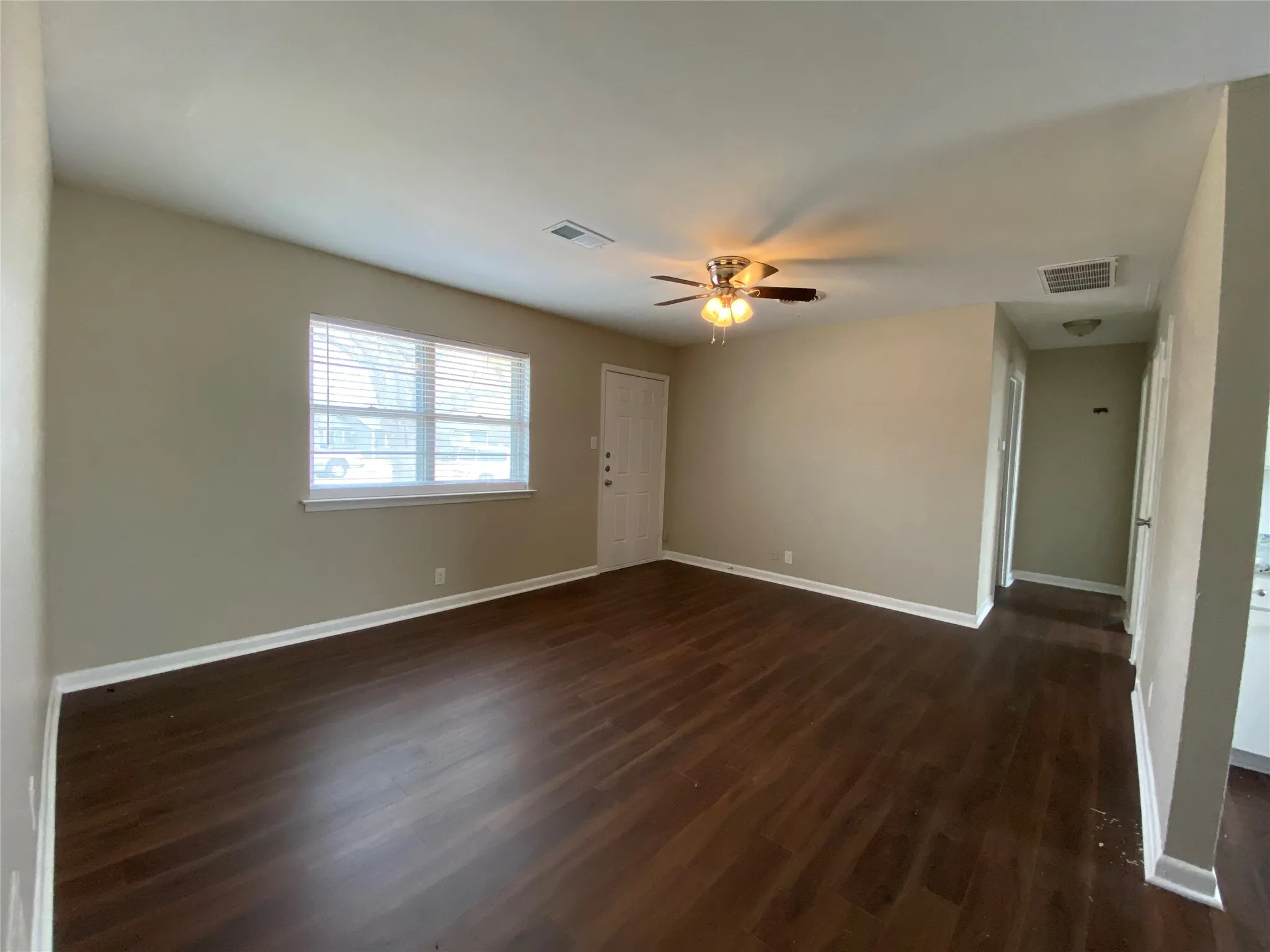 Here is the other side of the room. Notice the lighted ceiling fan to keep you cool during the hot months.