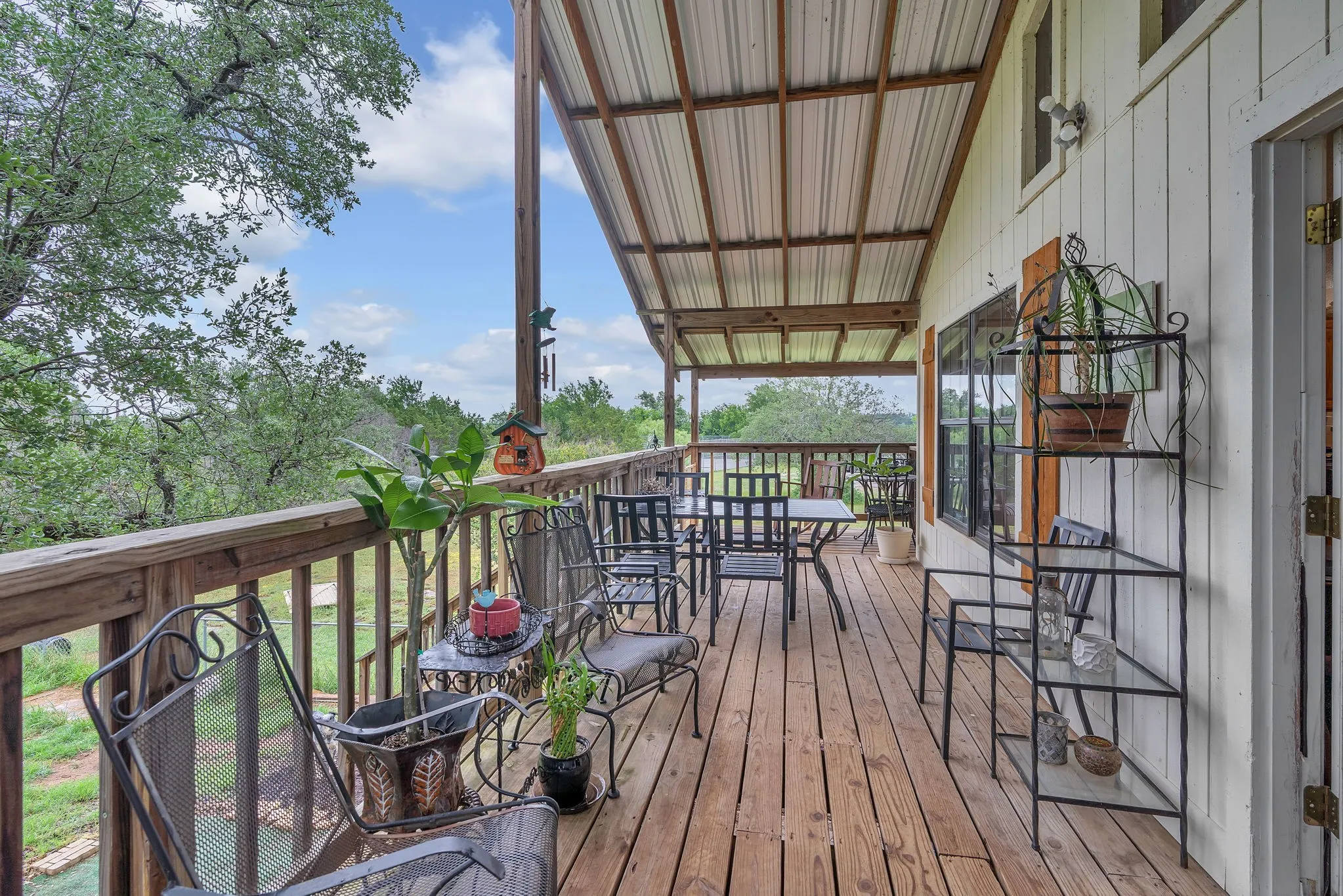 Extended deck area with room for multiple seating arrangements. Perfect for gatherings or enjoying the scenery.
