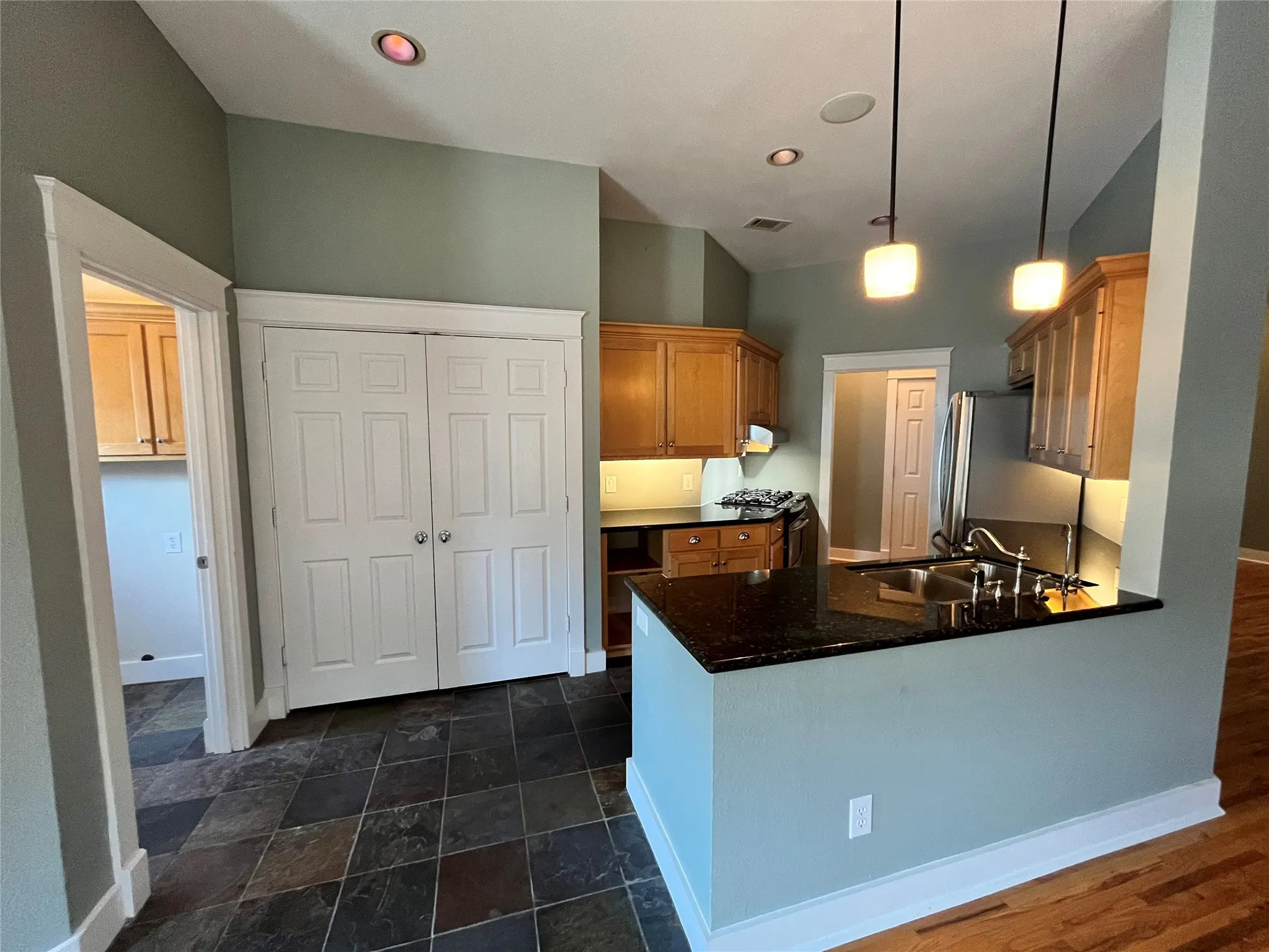 Modern kitchen island with a breakfast bar for quick meals.
