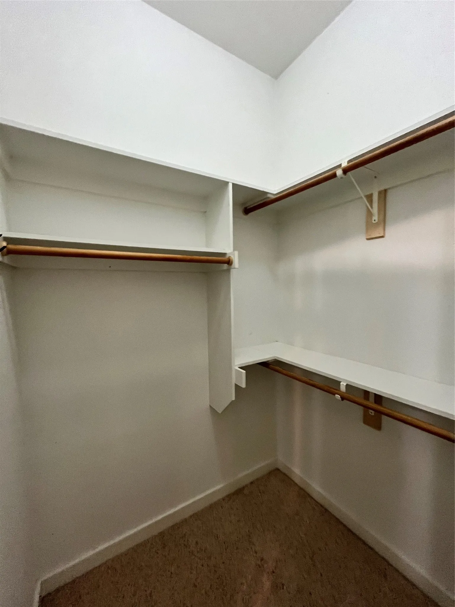 Additional storage closet, perfect for linens or seasonal items.