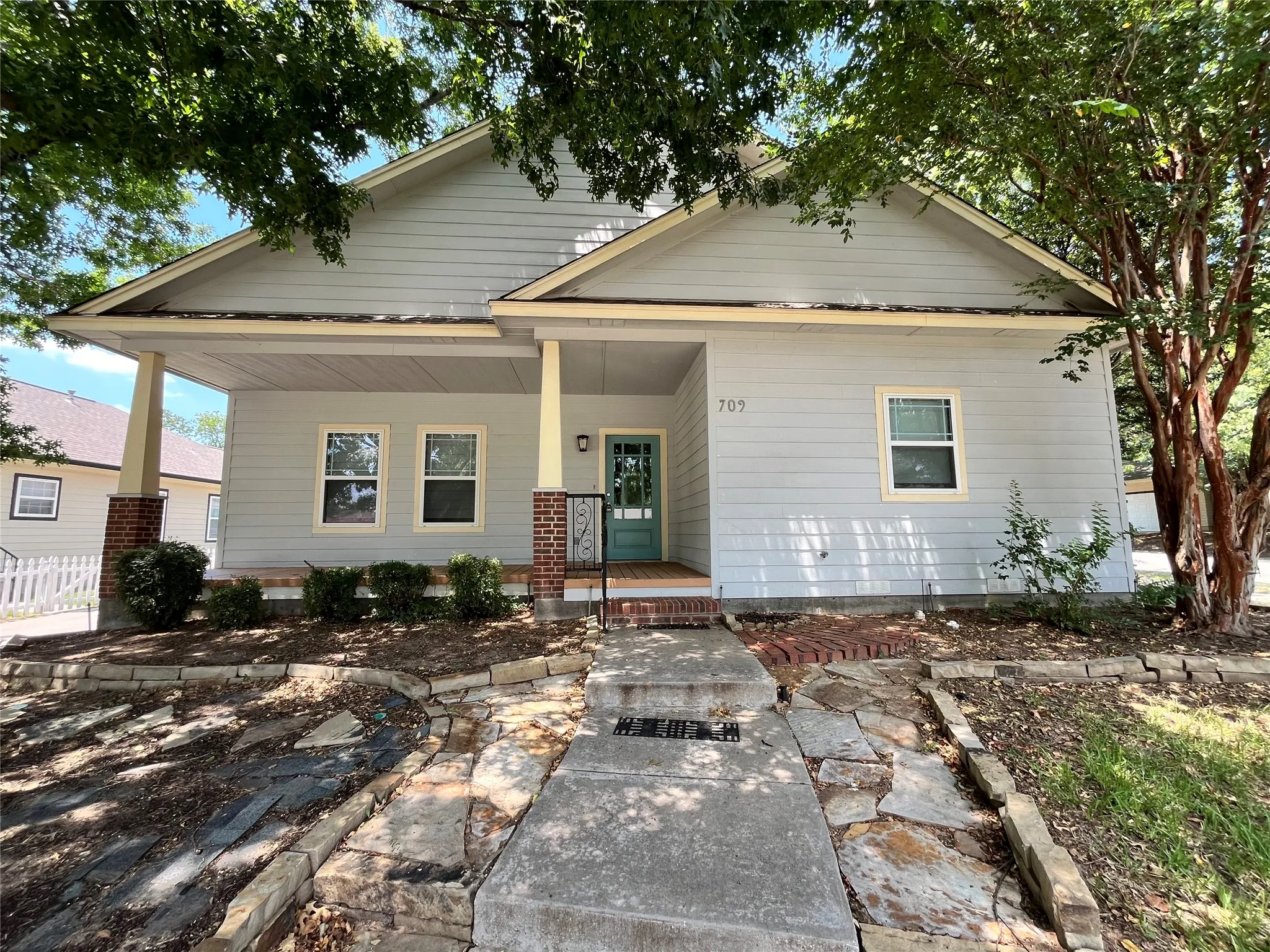 Front exterior showing the home’s unique architectural style.