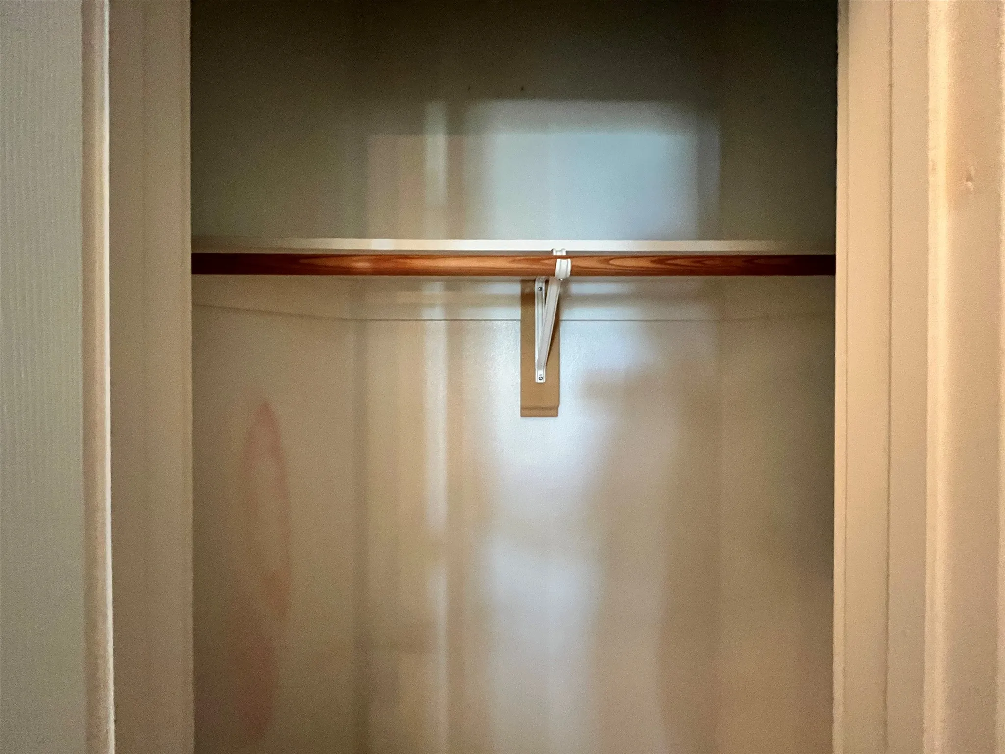 Detail of the closet shelving, great for staying organized.