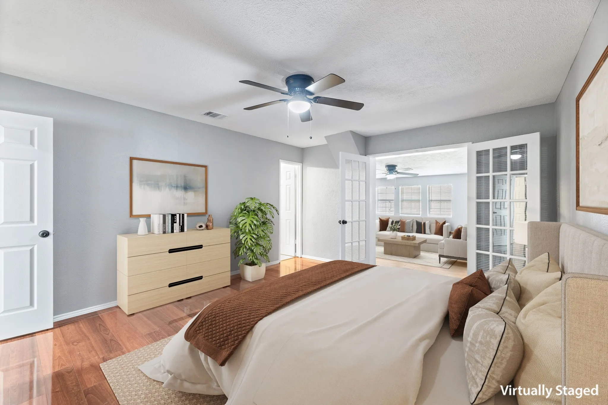 Virtual Staged JUST ADDED RECESSED LIGHTING! 9 2 2026. Primary Bedroom w private Living through French doors. Has ensuite, and walk in closet.