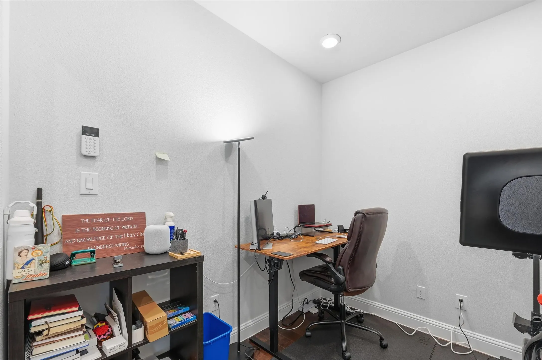 Office with baseboards and dark wood-style floors