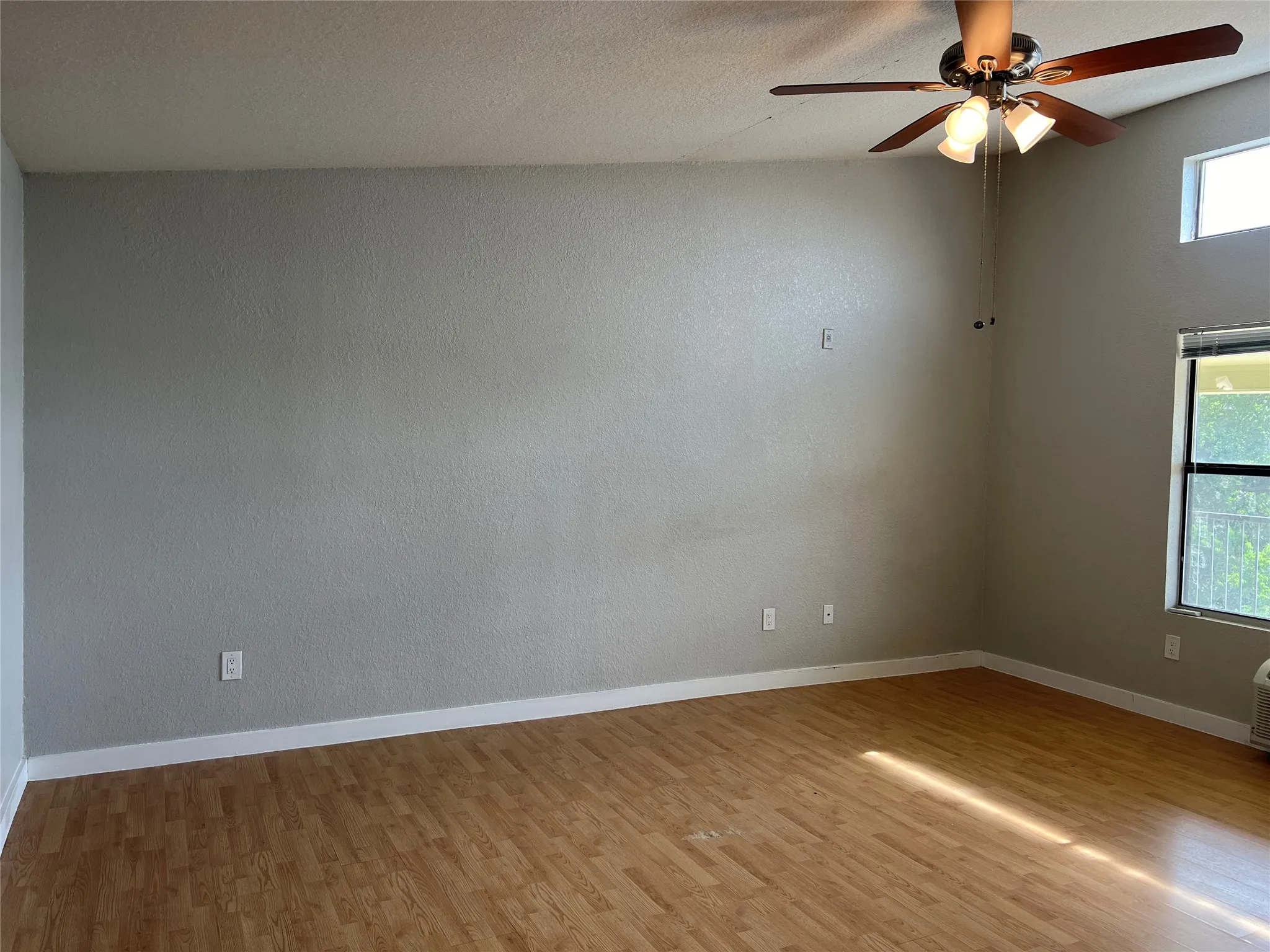 Wood-finish flooring with neutral wall tones