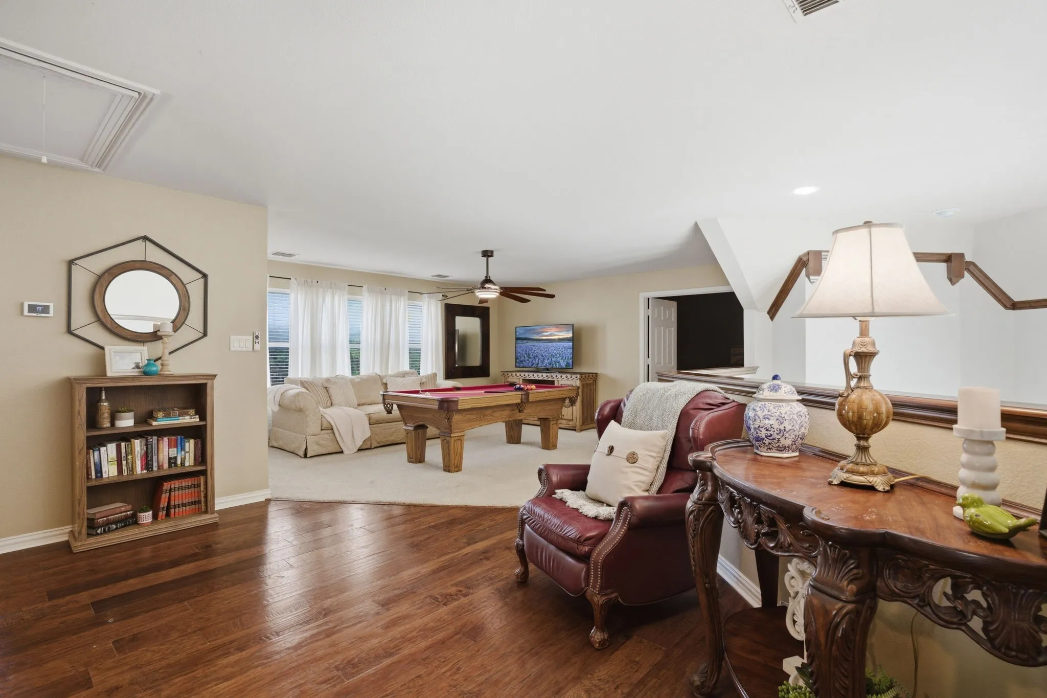 Upstairs, open concept loft with wood floors