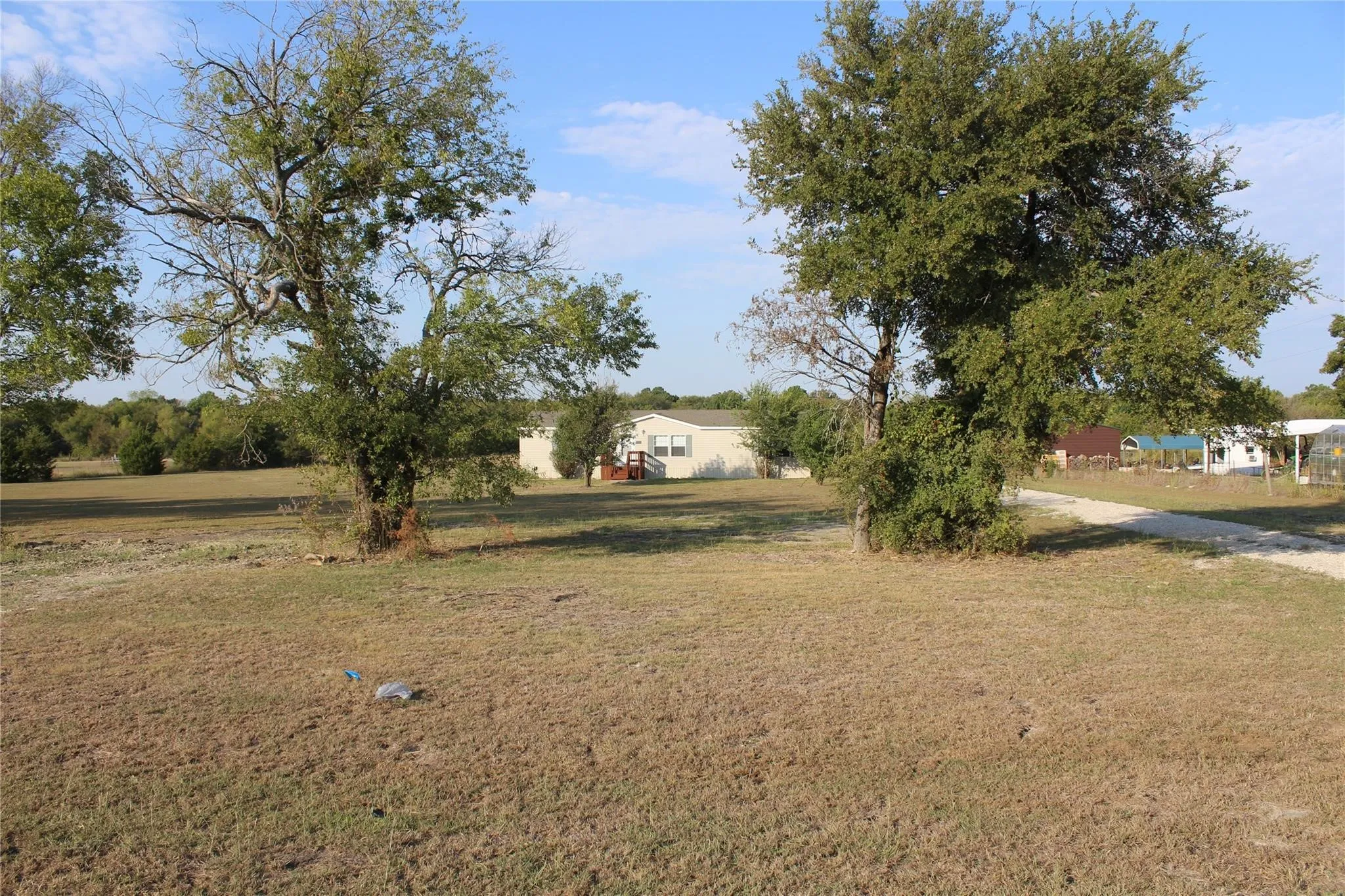 Mobile Home For Rent in Collin County , 1935 County Road 700, Farmersville, Texas 75442, 3 Bedrooms, 2 Bathrooms, Garage spaces, 1,664 Sqft, built in 2000, Preowned, Price $1,895, mls#21260583, Real Estate Agent in Farmersville, Homes For Rent in Collin county, Homes For Rent in Farmersville, Realtor in Farmersville Texas, Real Estate Brokerage Independent Realty Texas, Luminita Cordes Realtor