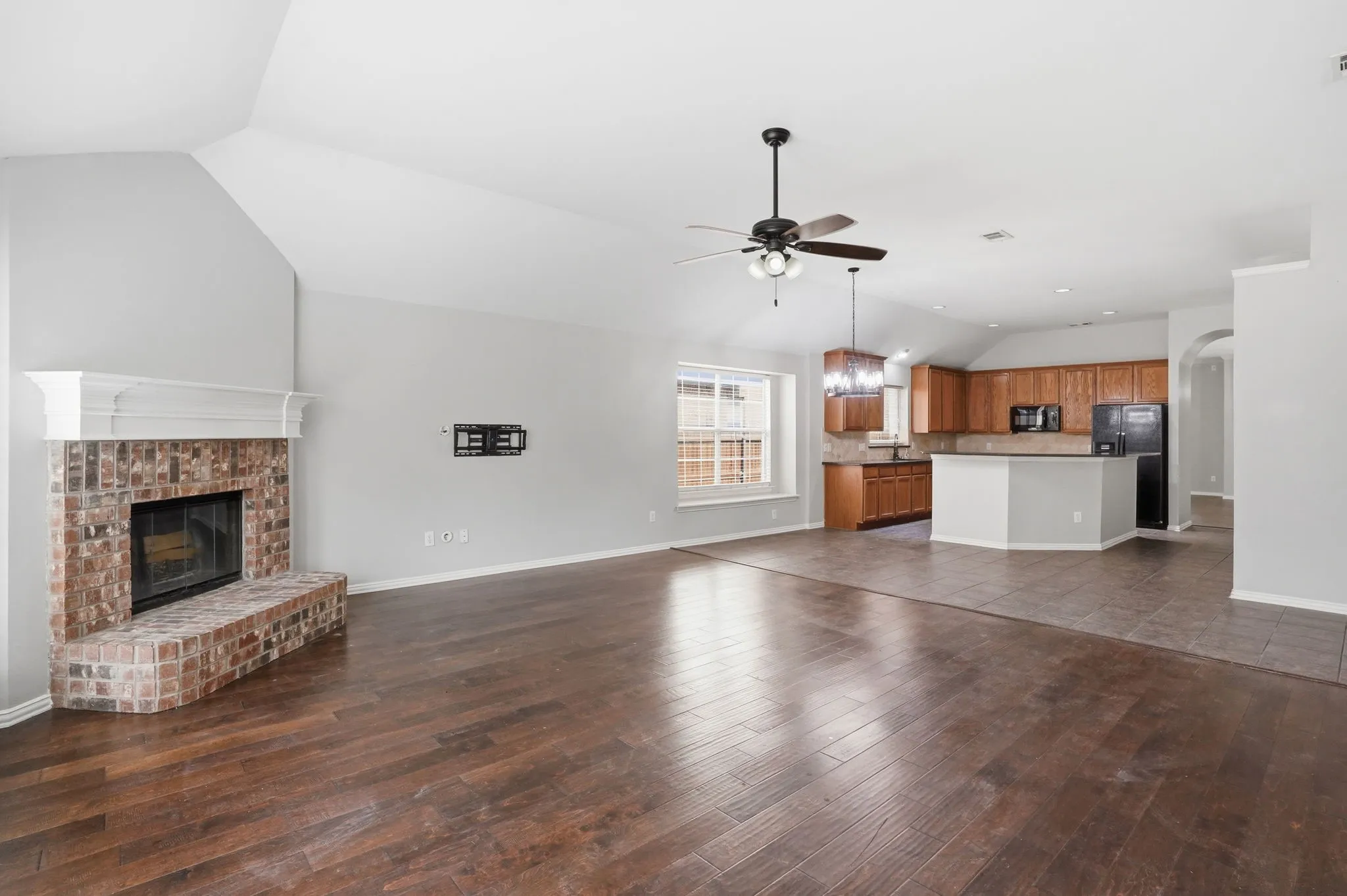 Family Room with view of Fireplace and Breakfast - Kitchen areas