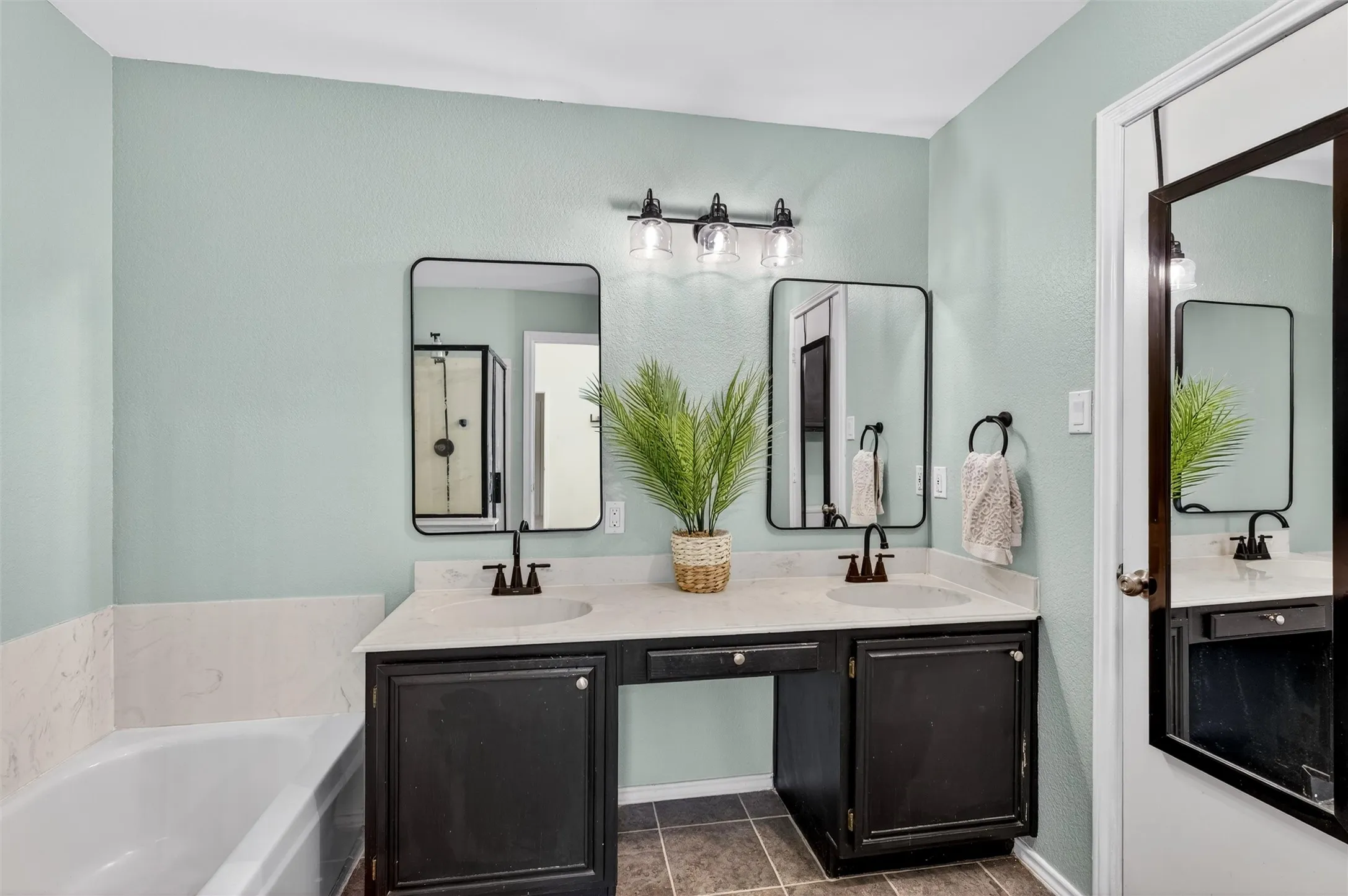 Double sinks, newer faucets and lighting
