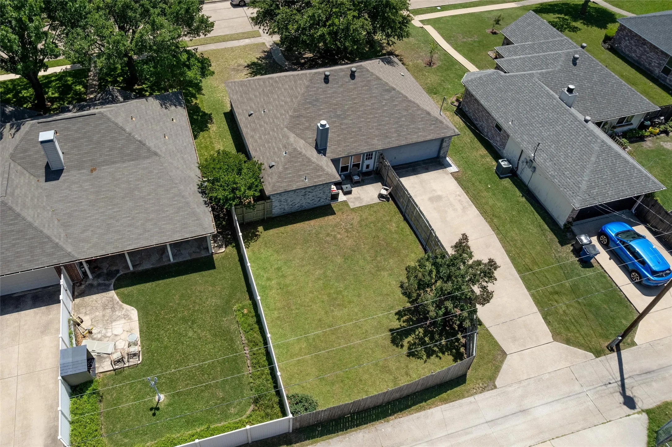 Long driveway with rear entry garage
