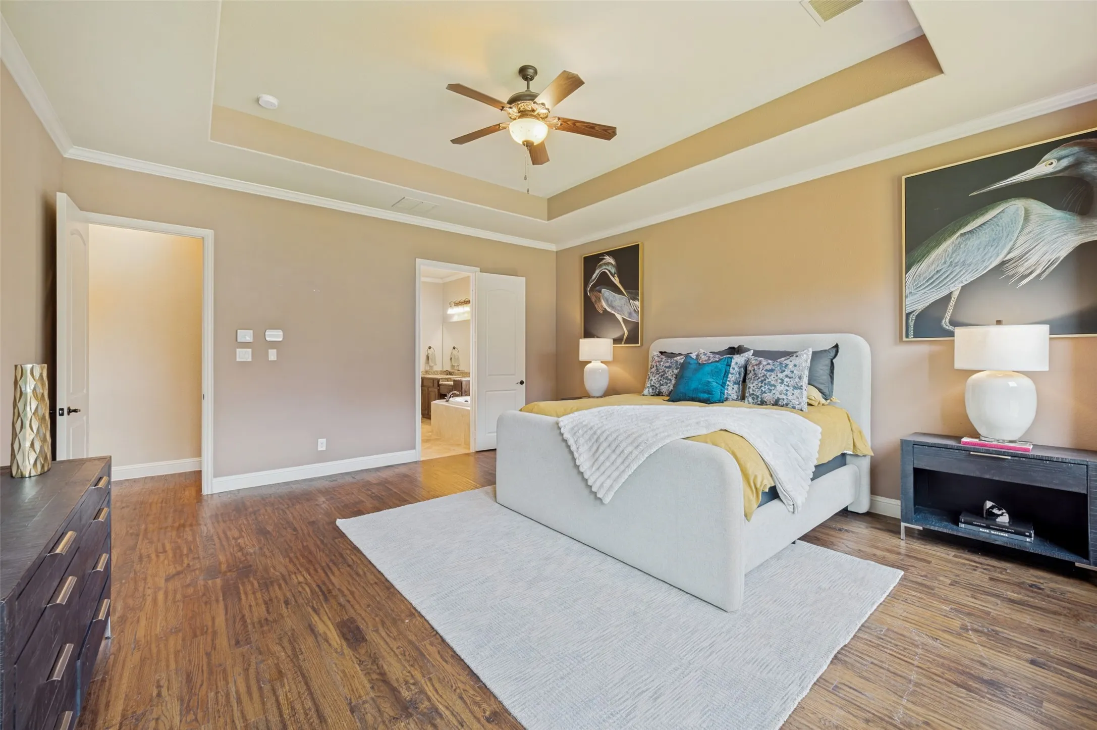 The spacious layout flows seamlessly into the luxurious ensuite bath, offering comfort, privacy, and plenty of room to relax at the end of the day.