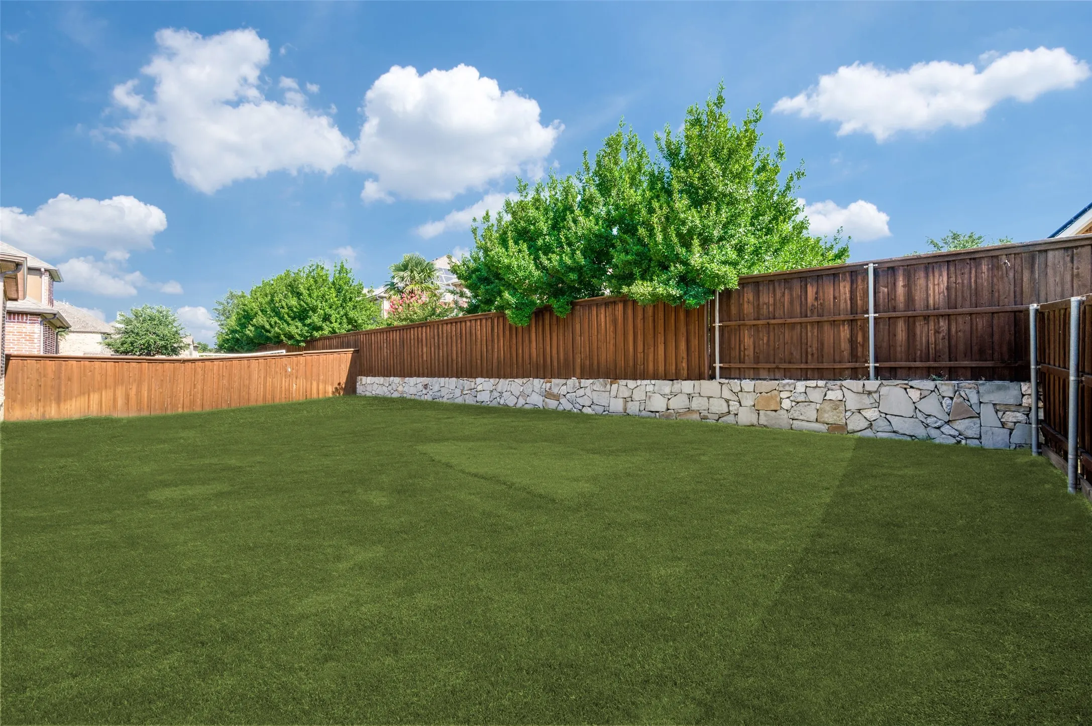 Spacious backyard offering endless possibilities to create your dream outdoor oasis. With plenty of room for a custom pool, play area, or garden, this private yard provides the perfect setting for entertaining, relaxing, and enjoying outdoor living.