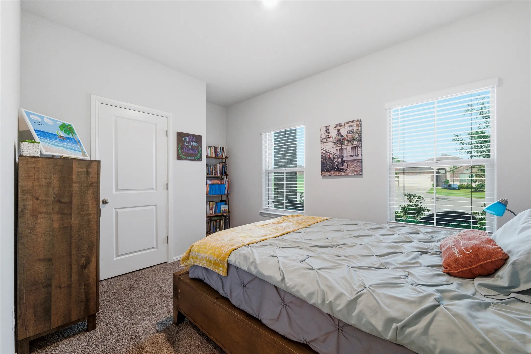 White wall interior with light brown carpet flooring