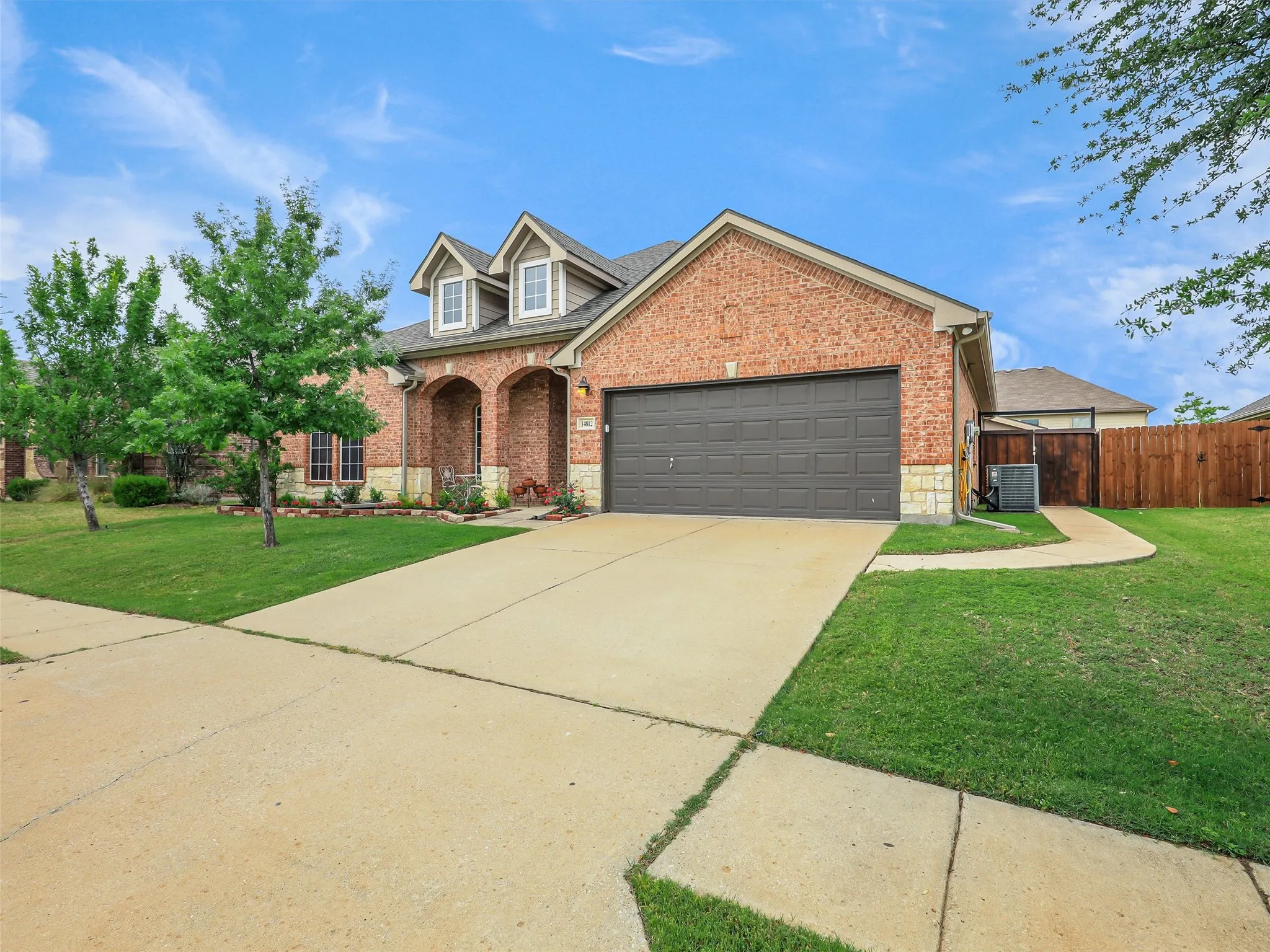 Covered Front Porch
Extended Covered patio
Rain Gutters
Landscaped Front yard
Zoned Sprinkler System in front and backyard