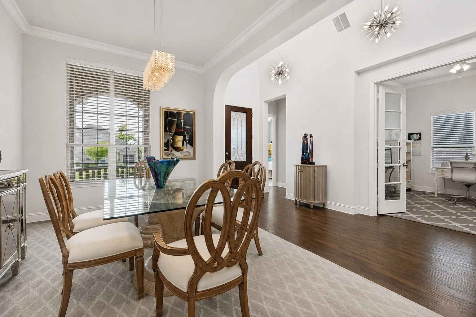 Large Dining Space with contemporary chandelier.