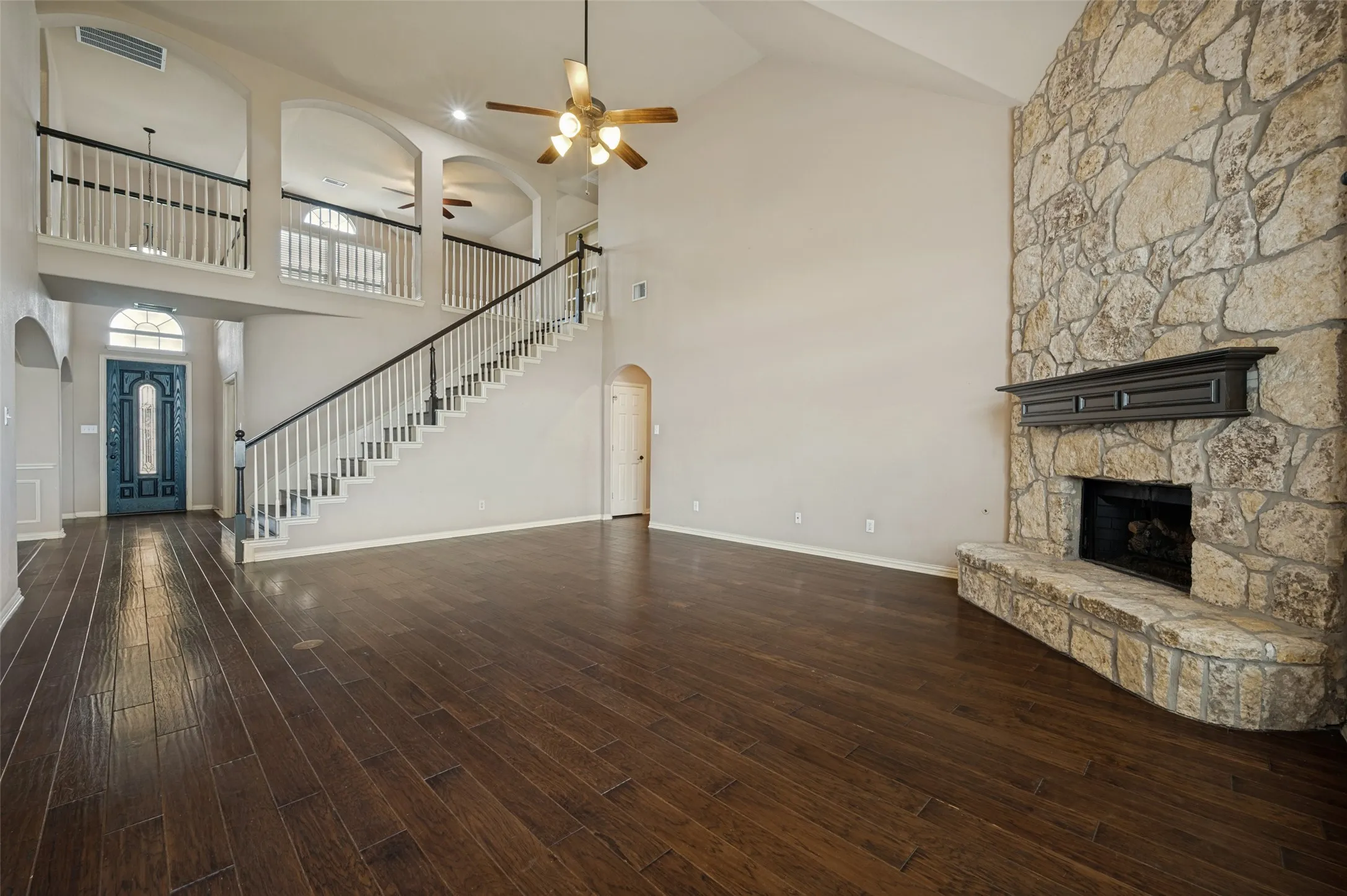 Open floor plan with loft above family room
