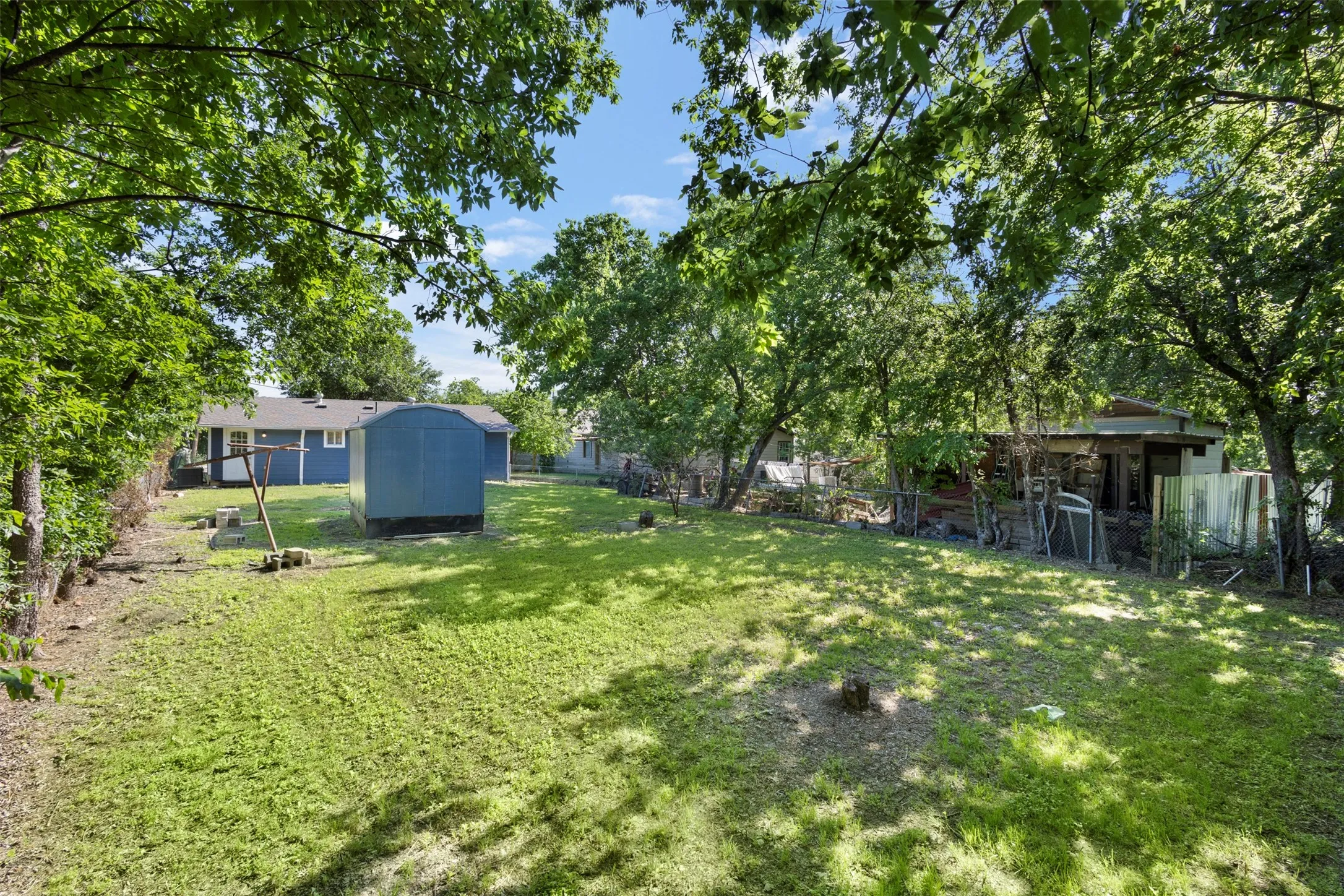 Back yard is quite large and offers a fabulous canvas for gardening, a gazebo, patio or whatever your heart desires!