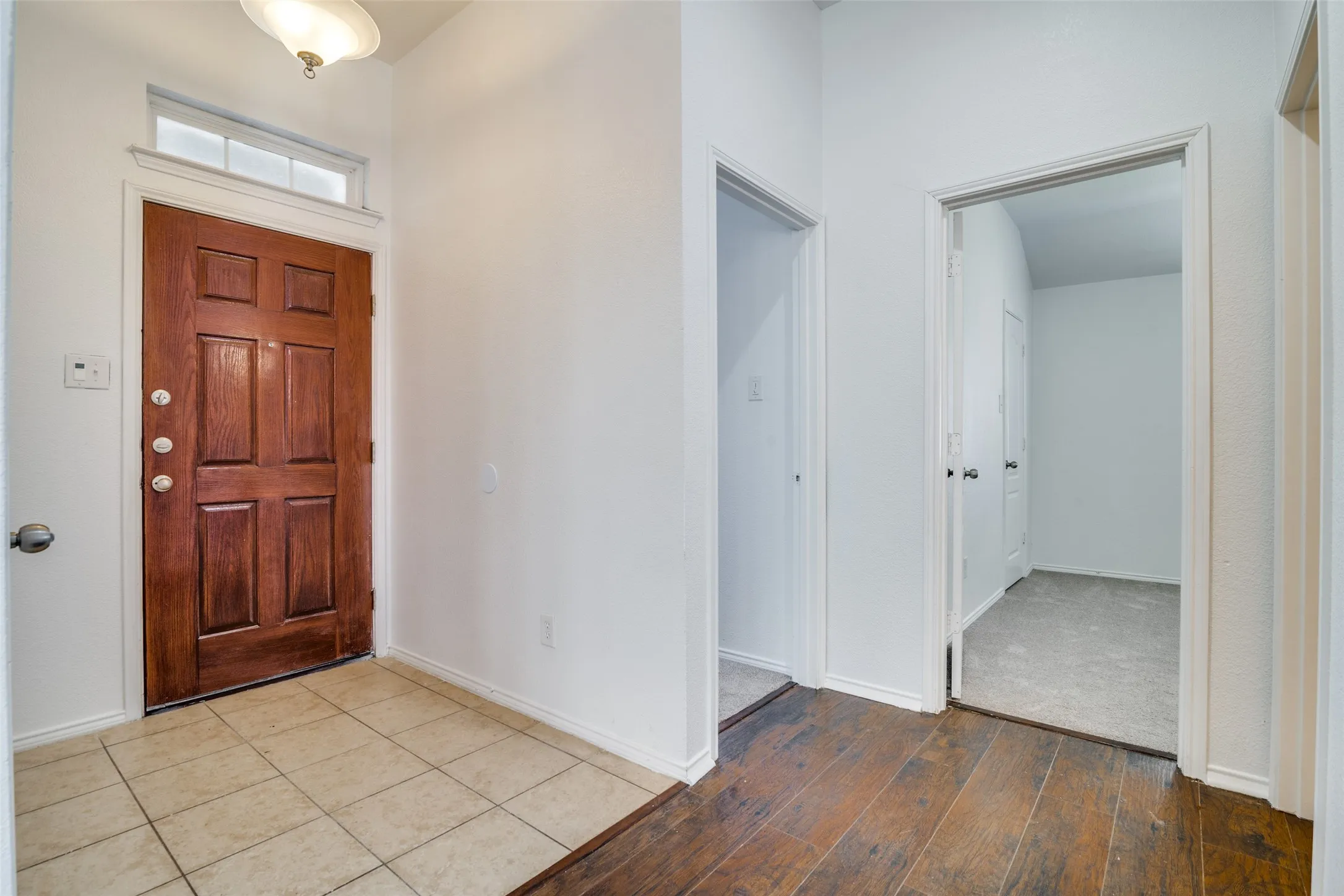 Foyer with light wood-type flooring