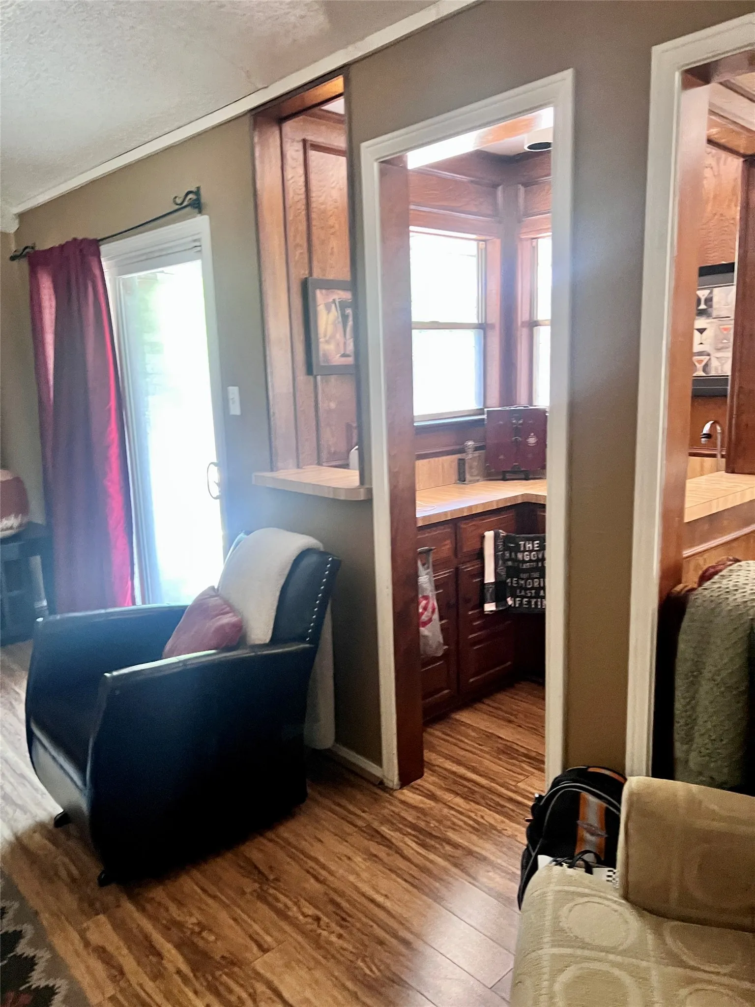 View from kitchen to wet bar area