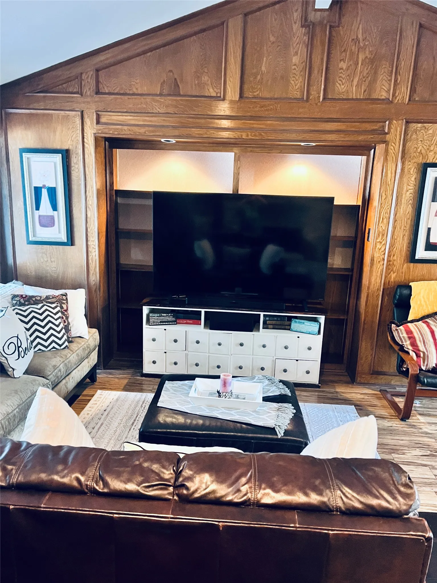 Living room with natural wood paneling